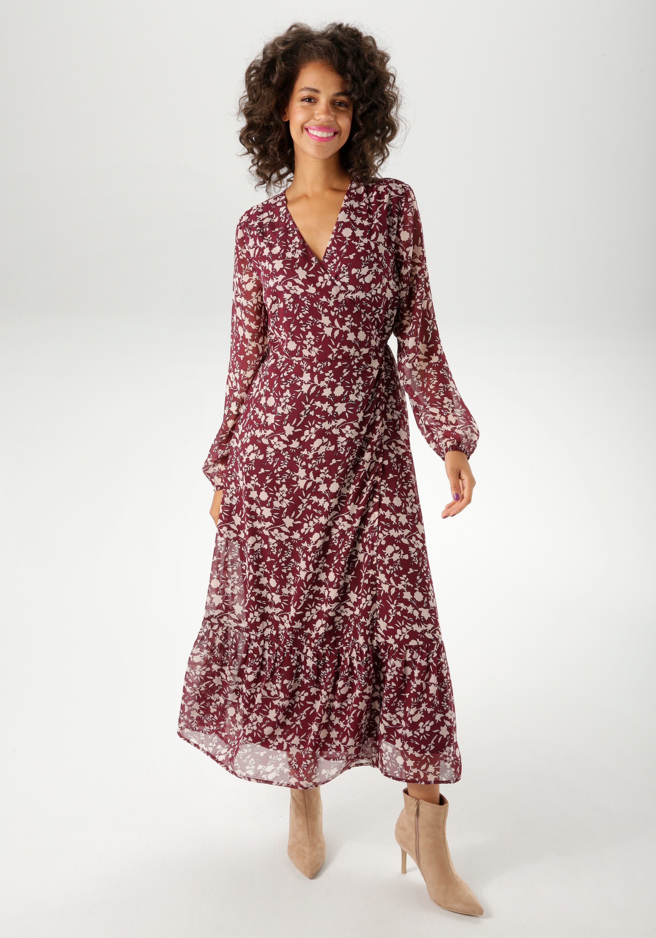 Aniston CASUAL Wickelkleid, mit grafischen Blumendruck - jedes Teil ein Uni günstig online kaufen