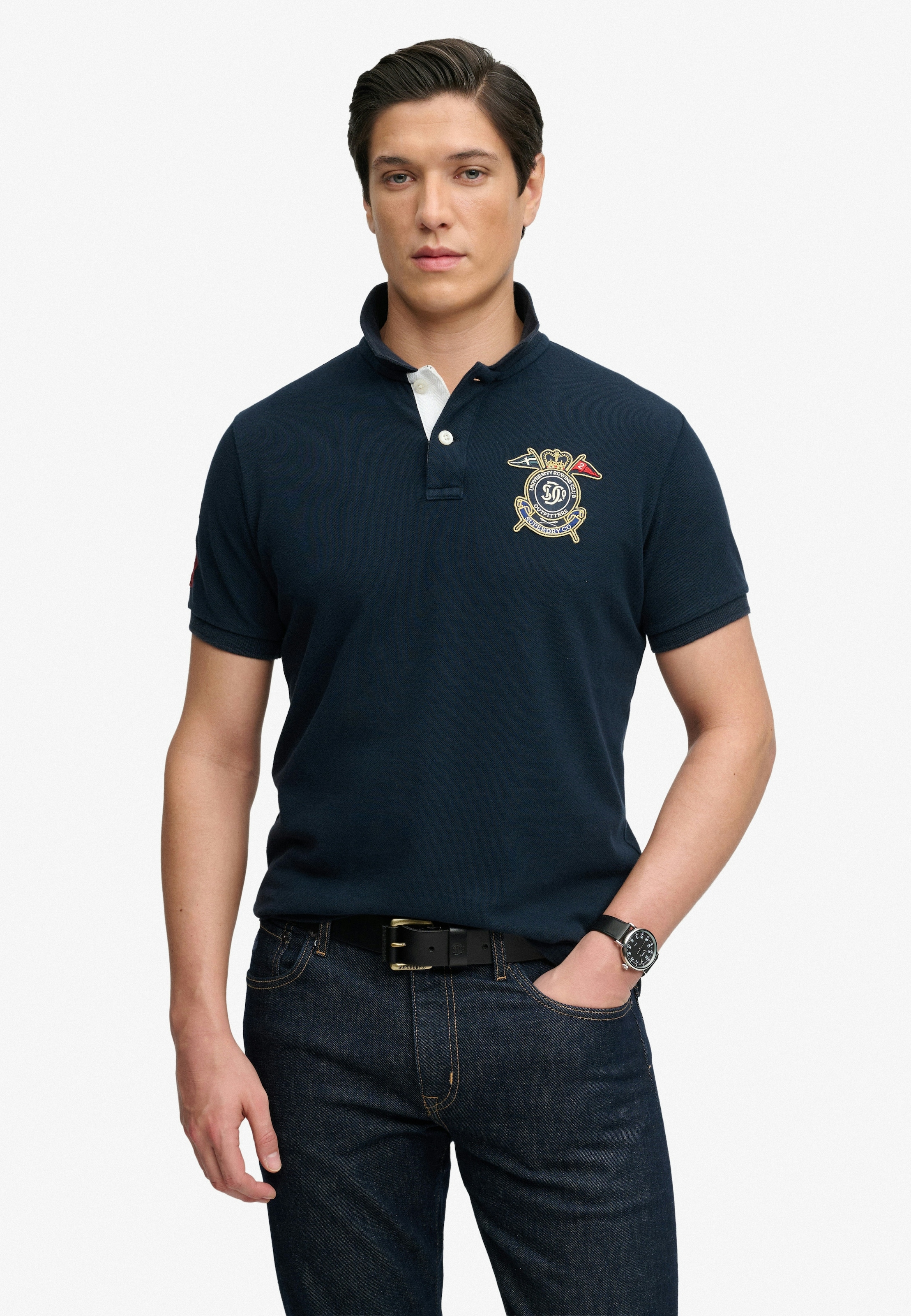 Superdry Poloshirt »CREST POLO« mit Markenlabel, aus Baumwolle, Relaxed Fit, bedruckte Optik