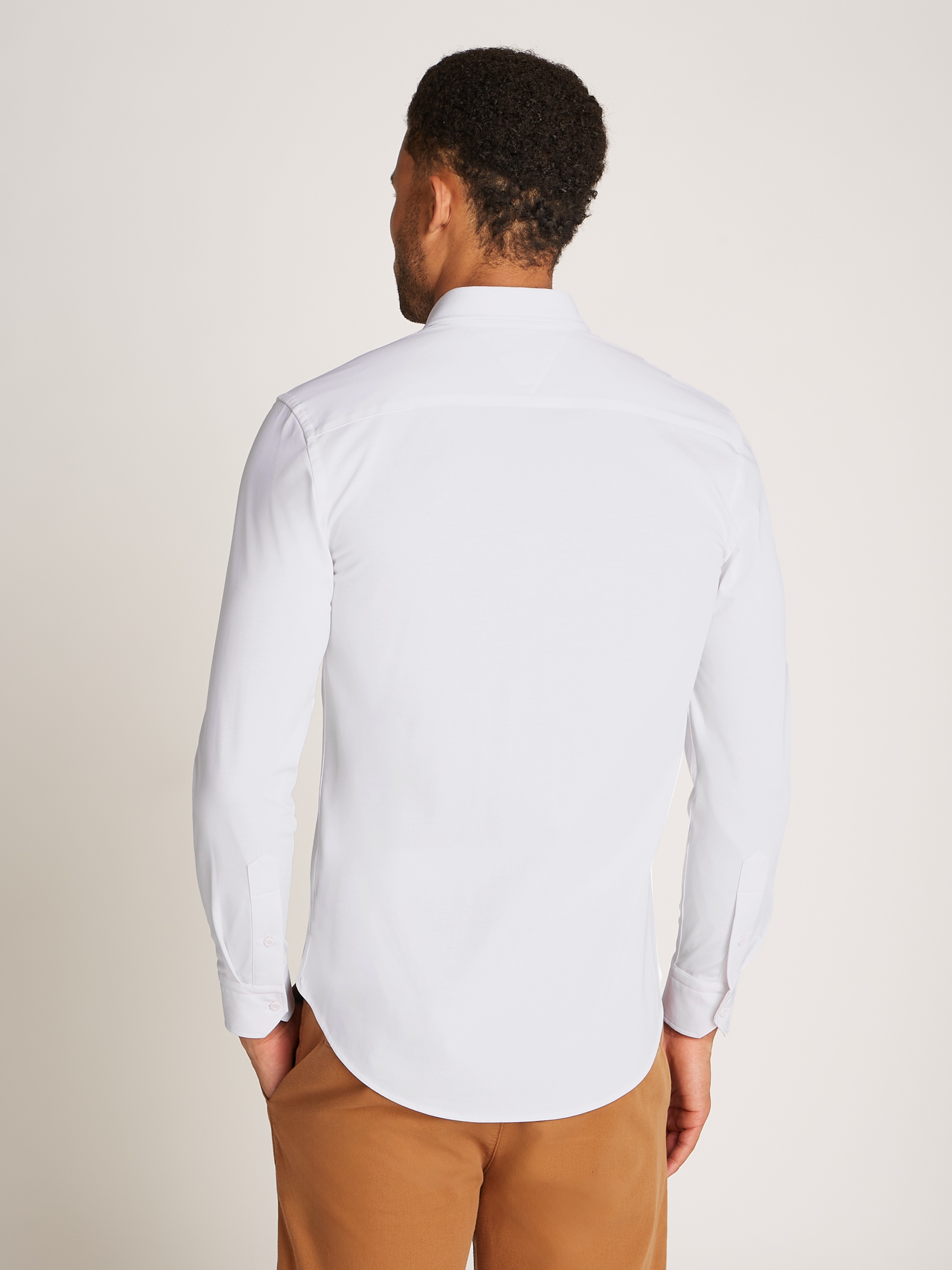 Tommy Hilfiger "PERFORMANCE KNIT SOLID Slim Fit SHIRT" mit Logostickerei günstig online kaufen