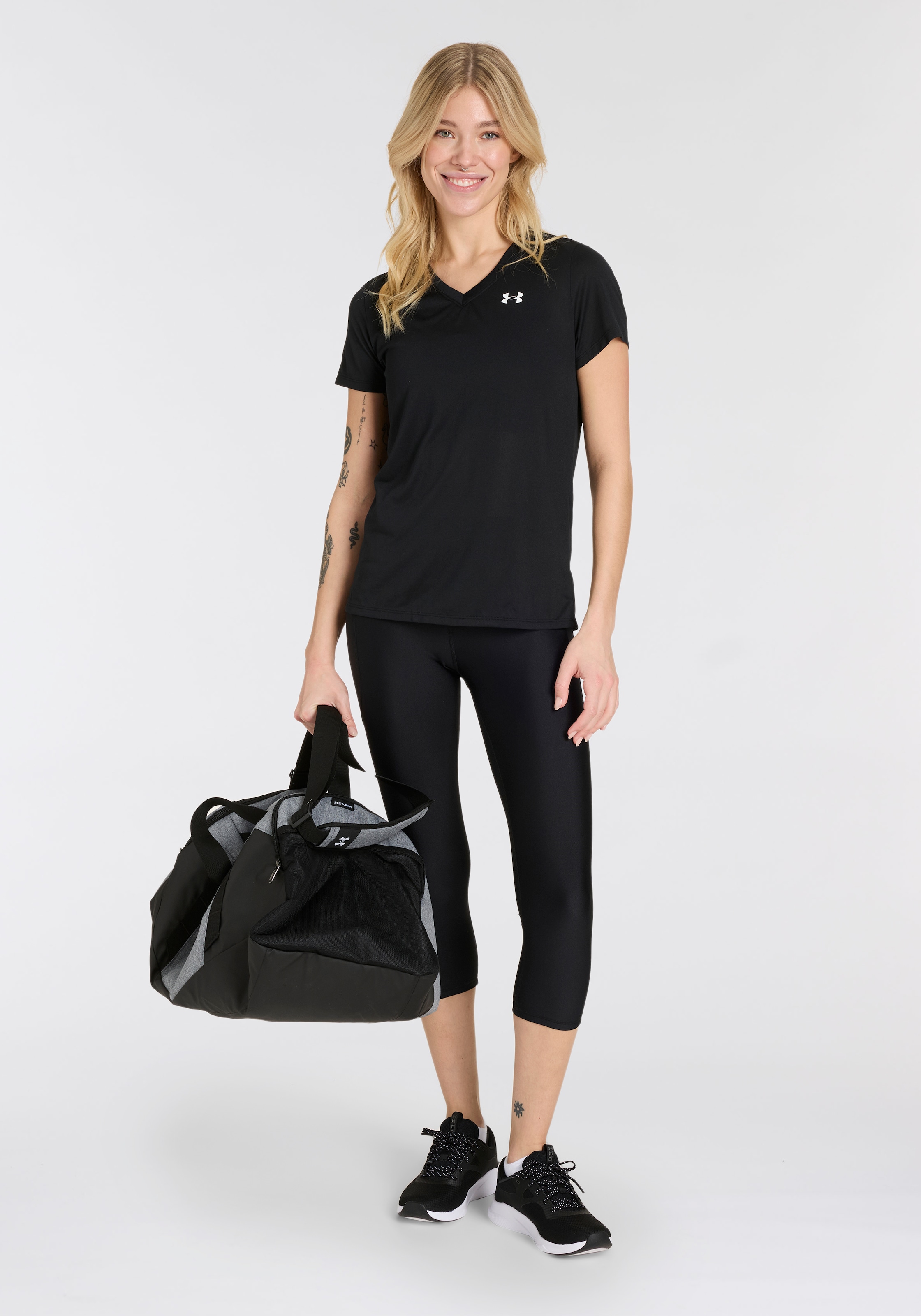 Under Armour® 3/4-Leggings »TECH«, Perfekt für die warmen Tage. Hält dich kühl und trocken.