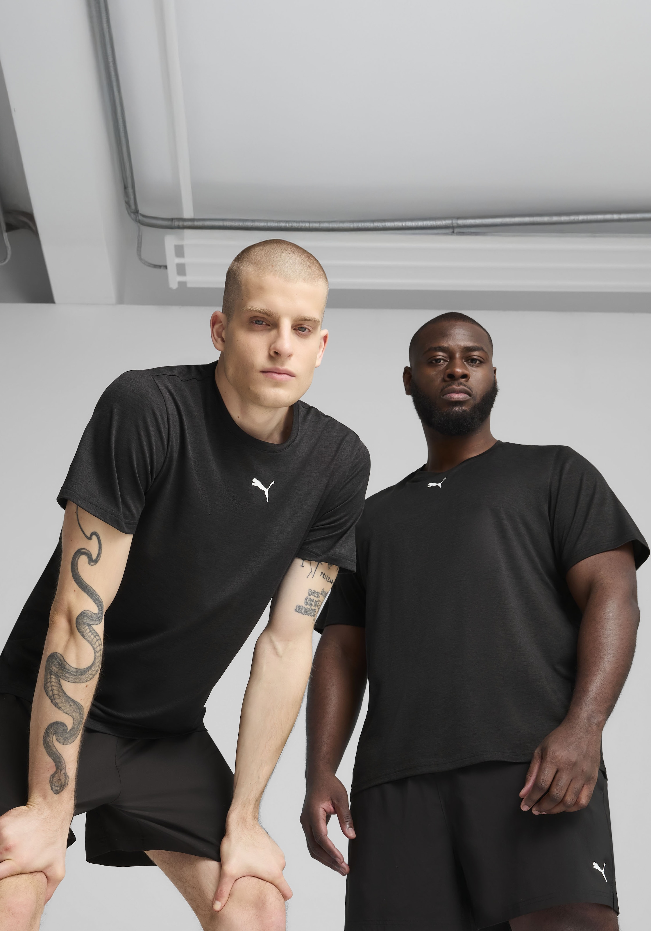 PUMA Trainingsshirt "M TAD ESSENTIALS HEATHER CAT TEE (CF SMALL CAT)" Basic-T-Shirt, Kurzarm, für Sportmode