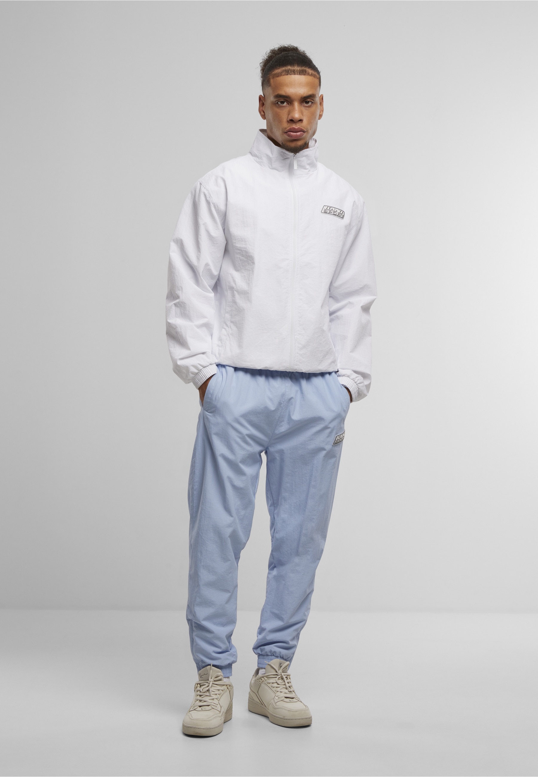 Karl Kani Trainingsjacke »Karl Kani Sport Patch Essential Trackjacket white« 1 Stk. tlg. ohne Kapuze