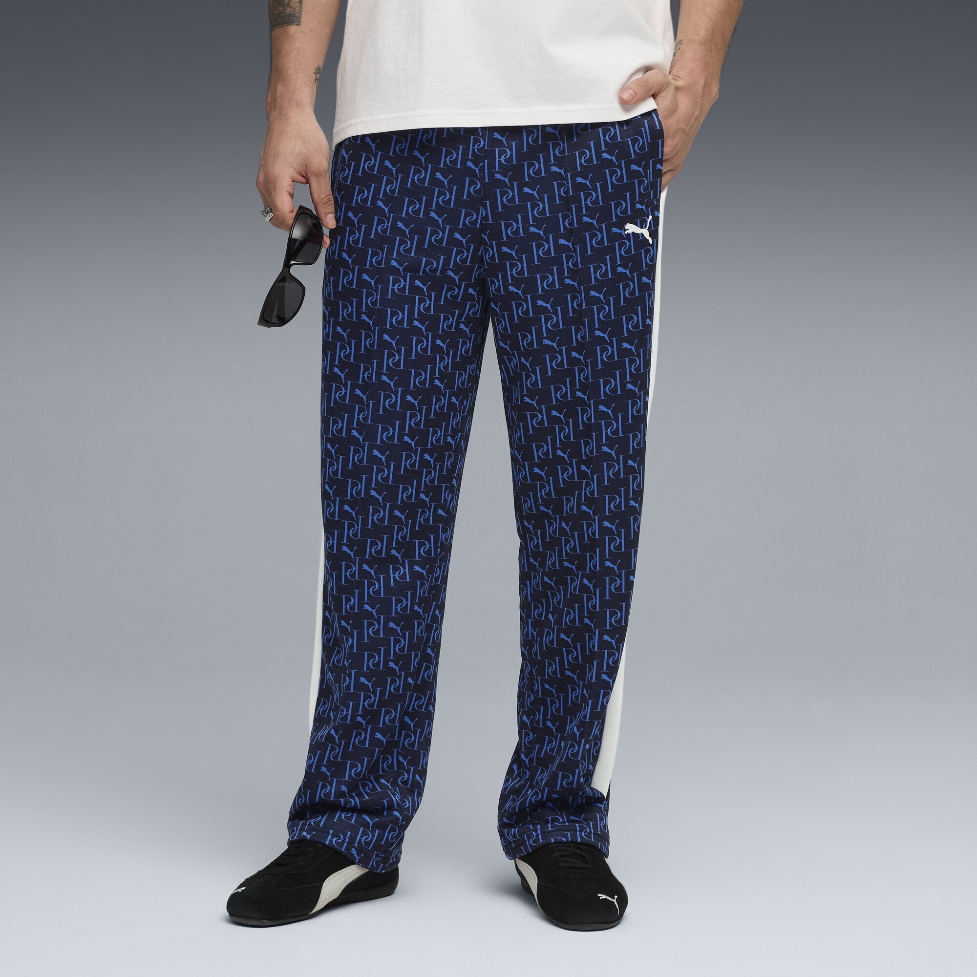 PUMA Sporthose »T7 Allover-Print Relaxed Trainingshose Herren«