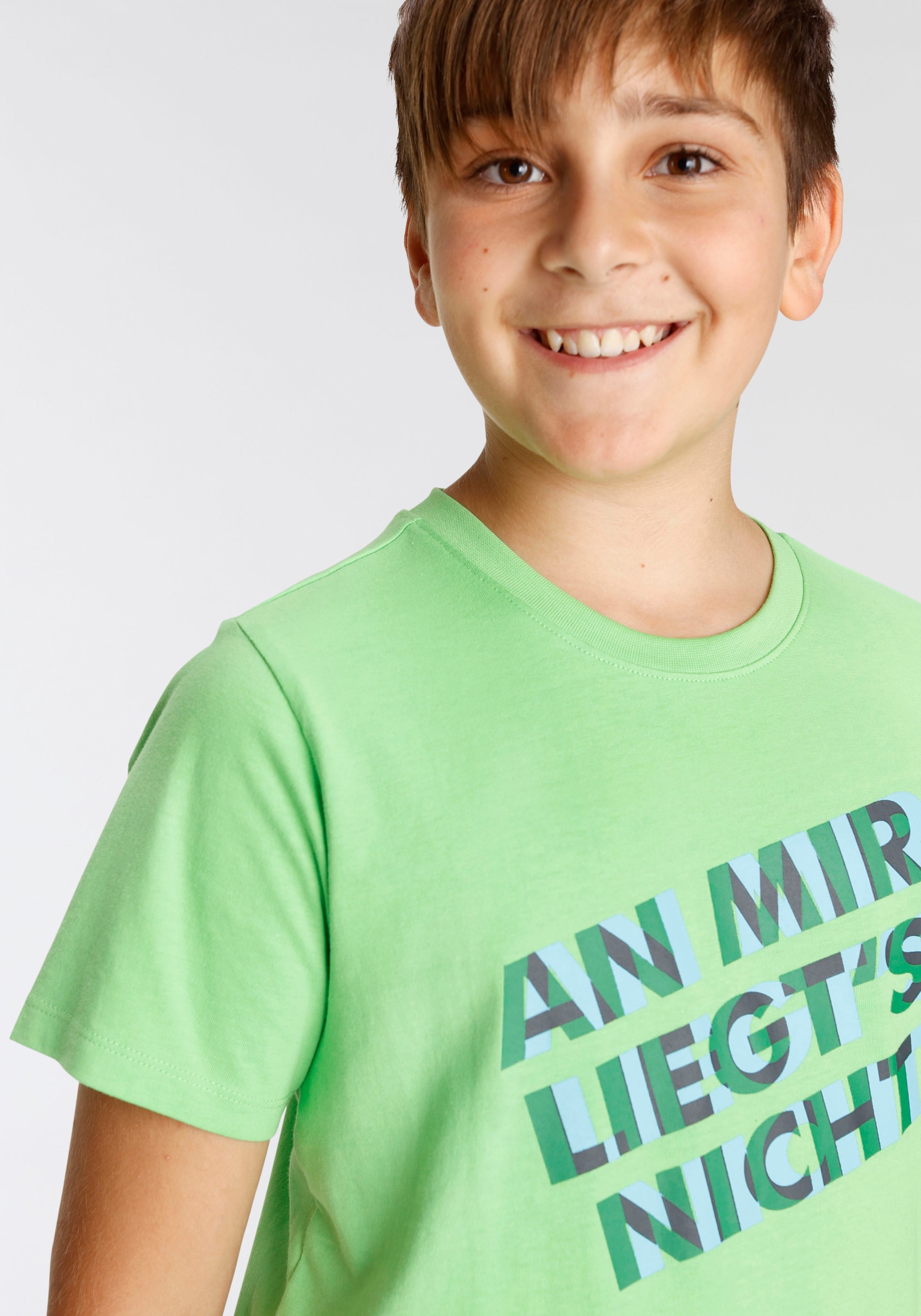 KIDSWORLD T-Shirt »AN MIR LIEGT´S NICHT«, Spruch online kaufen | BAUR