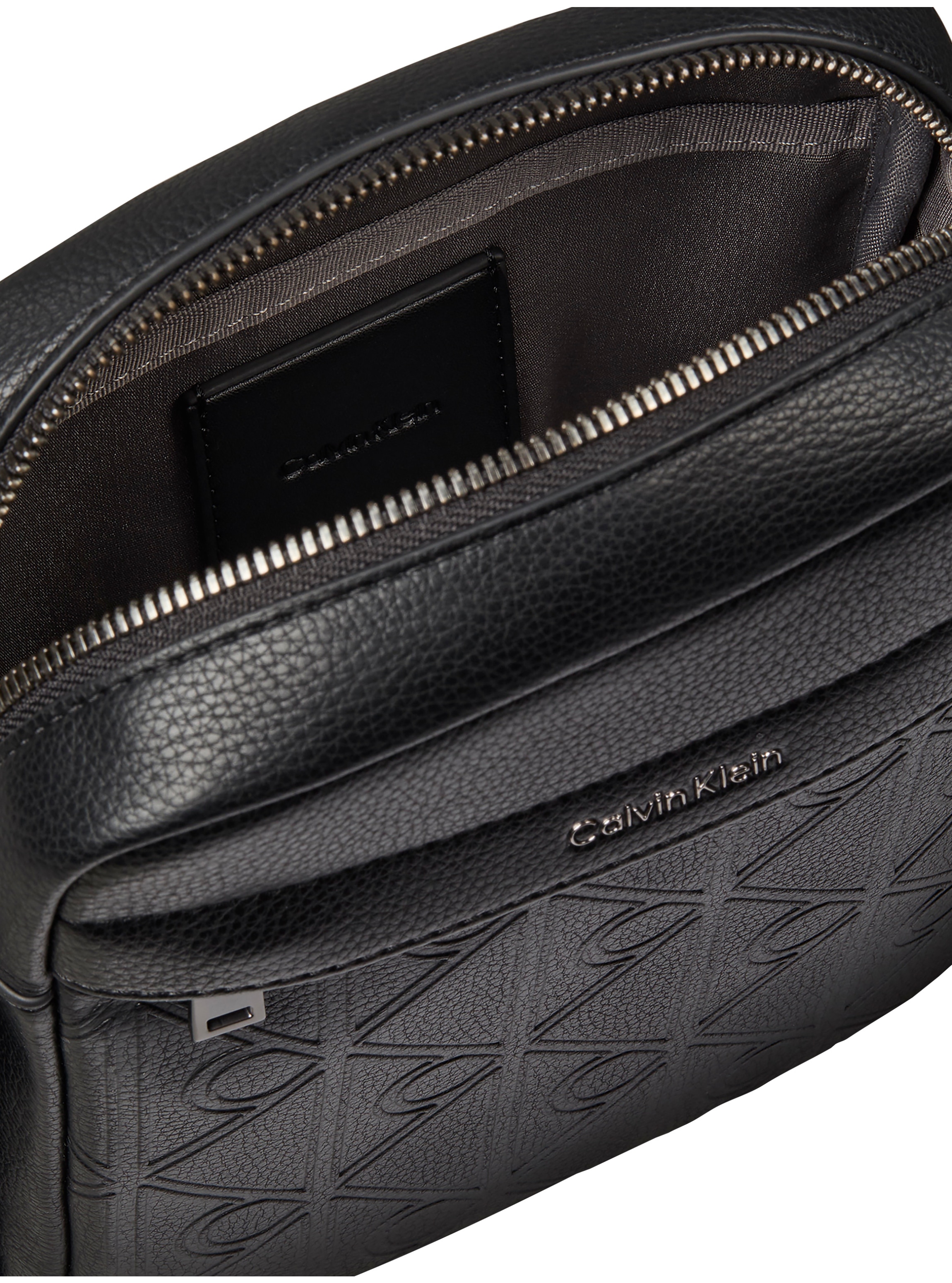 Calvin Klein Umhängetasche »EMBLEM AOP DEBOSS REPORTER« Unisex Mini Bag, Body Bag, Schultertasche mit CK-Logoprägung