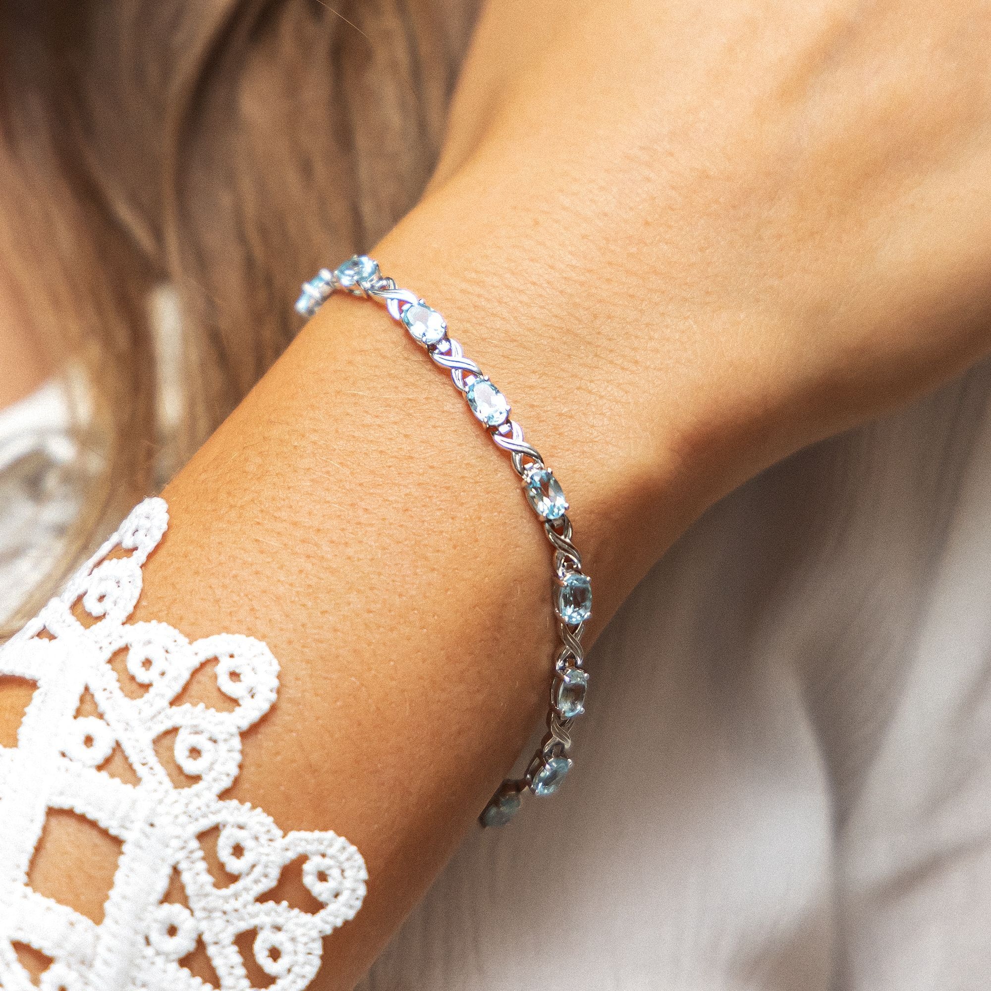 Zeeme Armband »Silber 925 rhodiniert 19cm lang mit 14x Blautopas (beh.)«