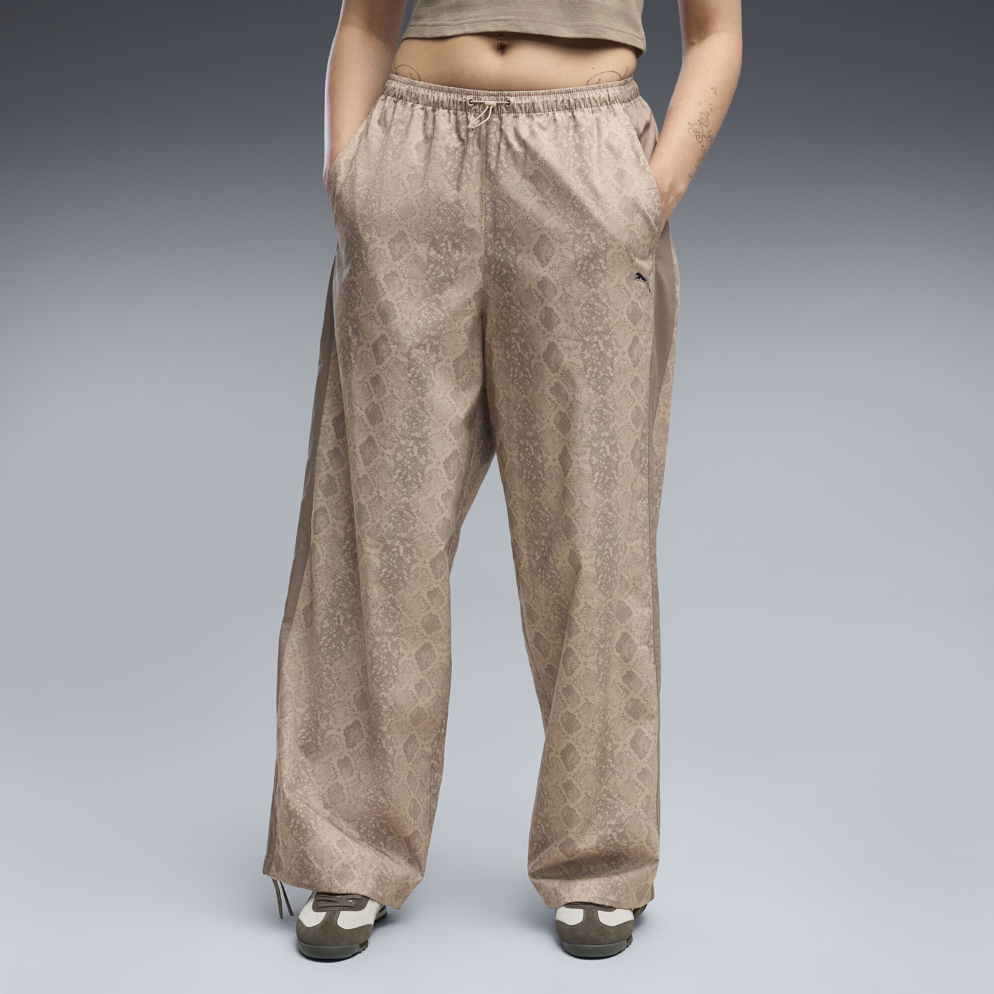 PUMA Sporthose »T7 Relaxed Snake Print Hose Damen«