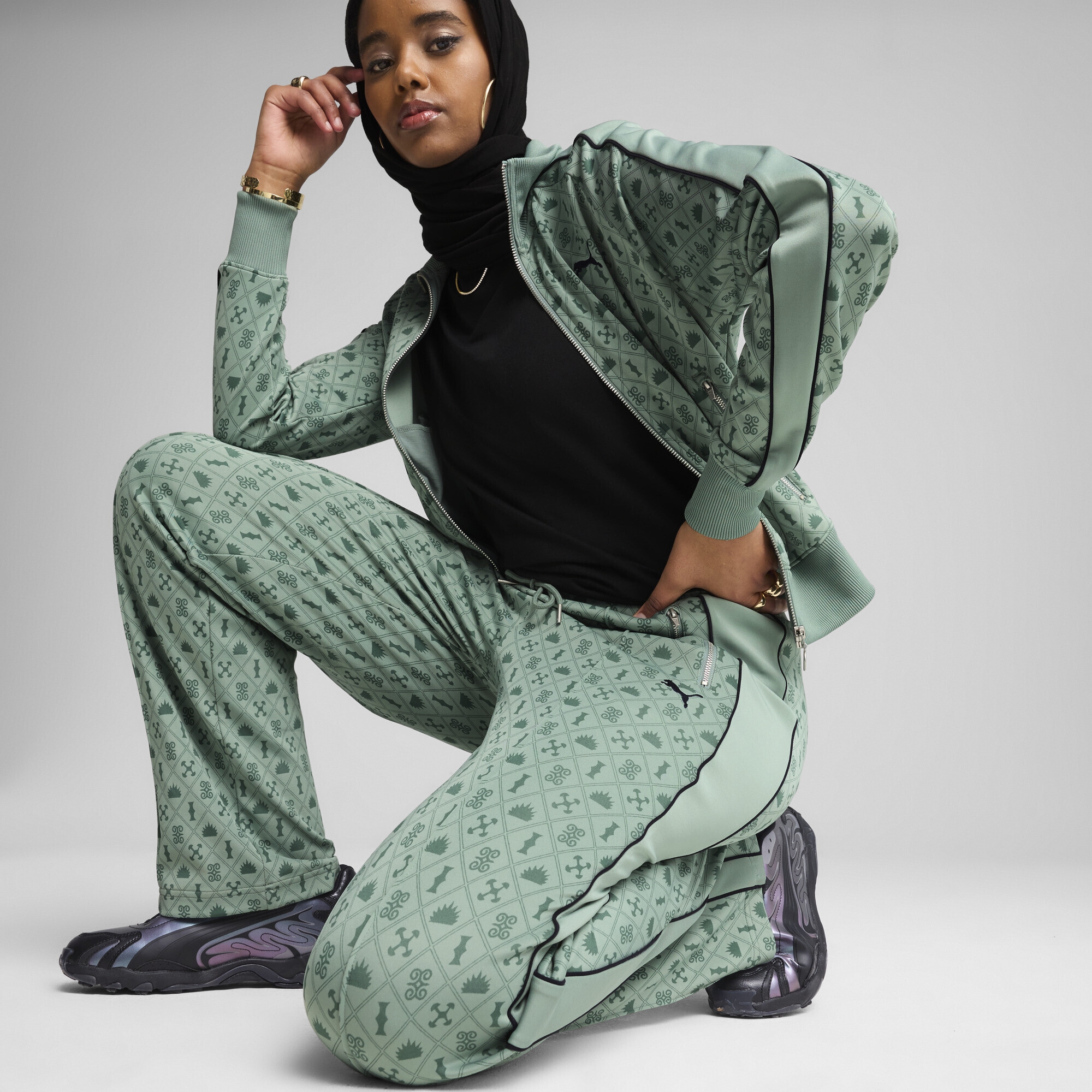 PUMA Sporthose »Road To Unity Straight Bedruckte T7 Trainingshose Damen«