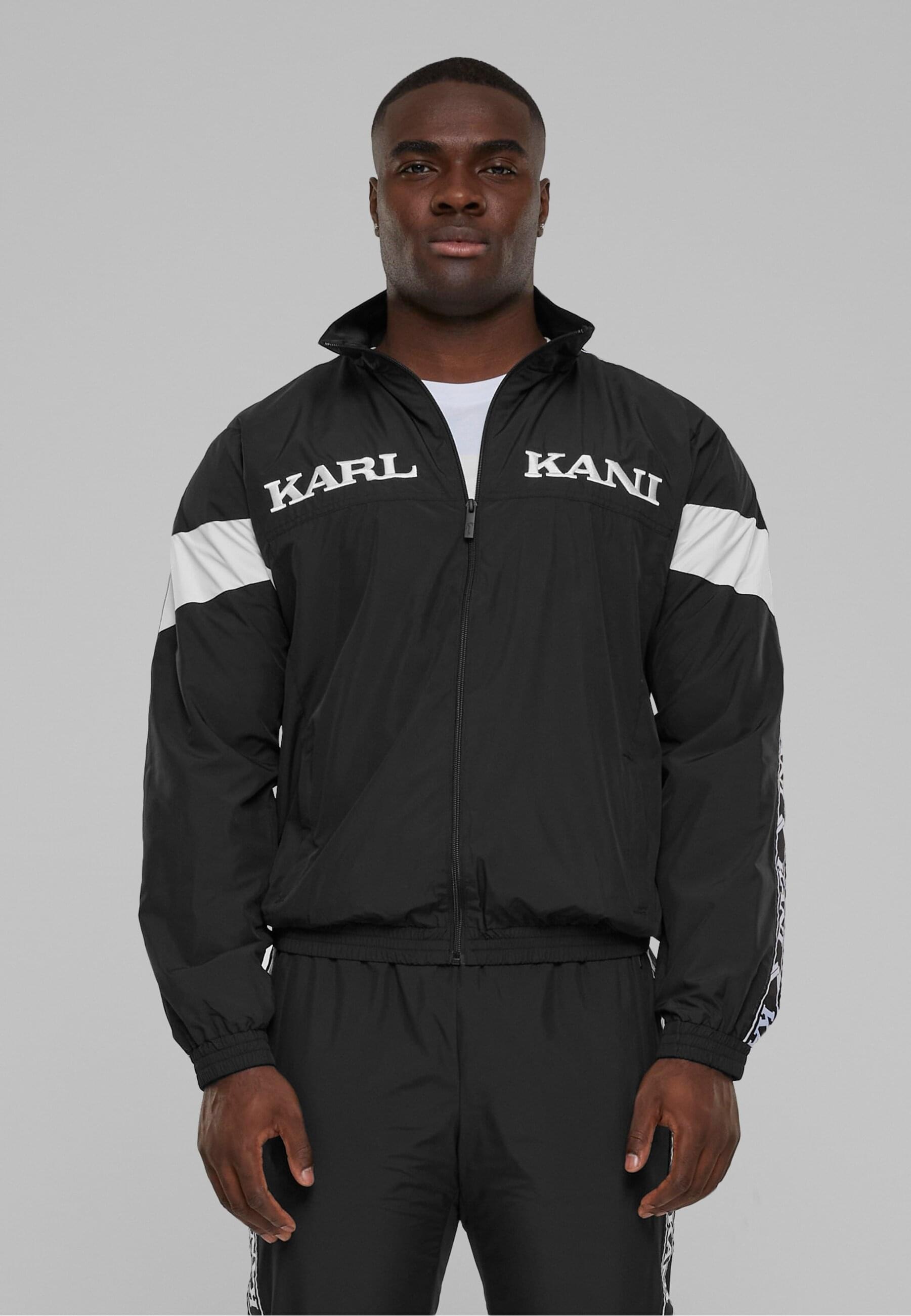 Karl Kani Allwetterjacke »Karl Kani Herren KKMQ32024BLK KK Retro Tape Trackjacket«, (1 St.), ohne Kapuze