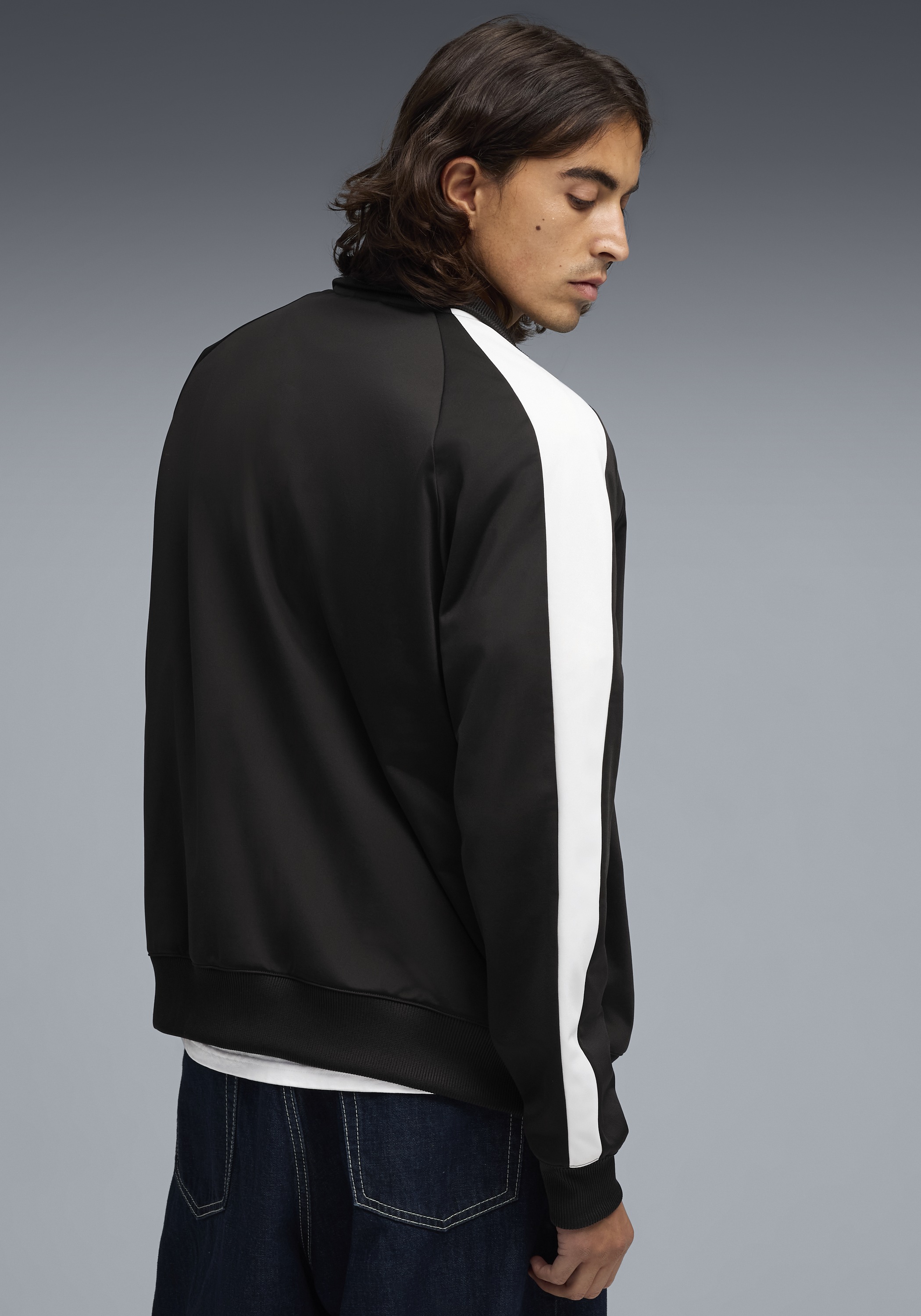 PUMA Trainingsjacke "T7 FOUNDATION POLY TRACK JACKET" ohne Kapuze mit Stehk günstig online kaufen