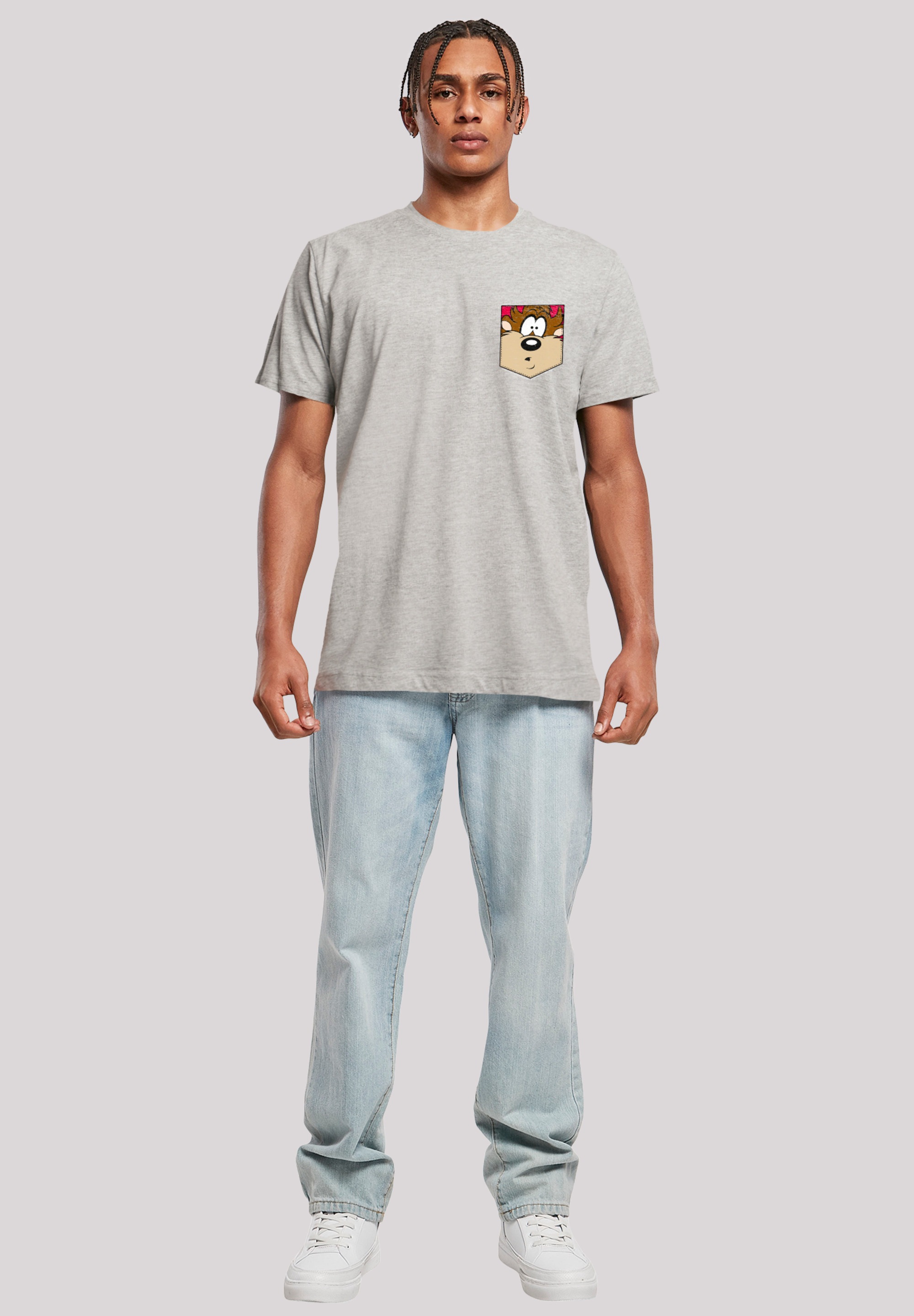 F4NT4STIC T-Shirt »Looney Tunes Tasmanian Devil Face Faux Pocket«, Print