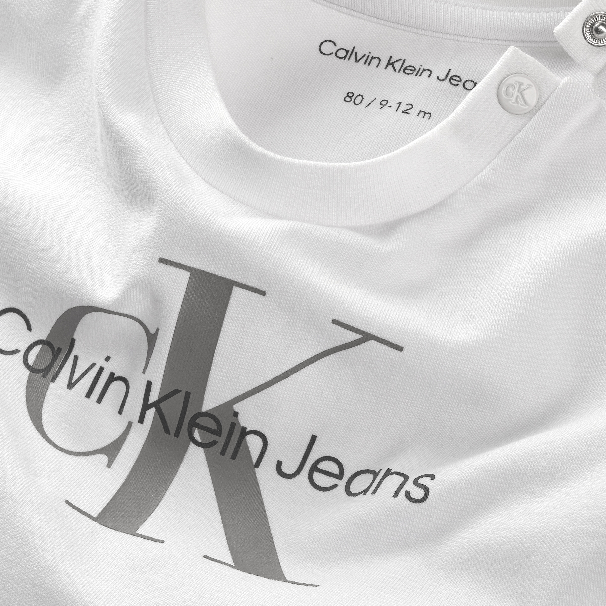 Calvin Klein Jeans Langarmshirt »MONOGRAM LS T-SHIRT«, für Babys bis 2 Jahre, mit großem Druck