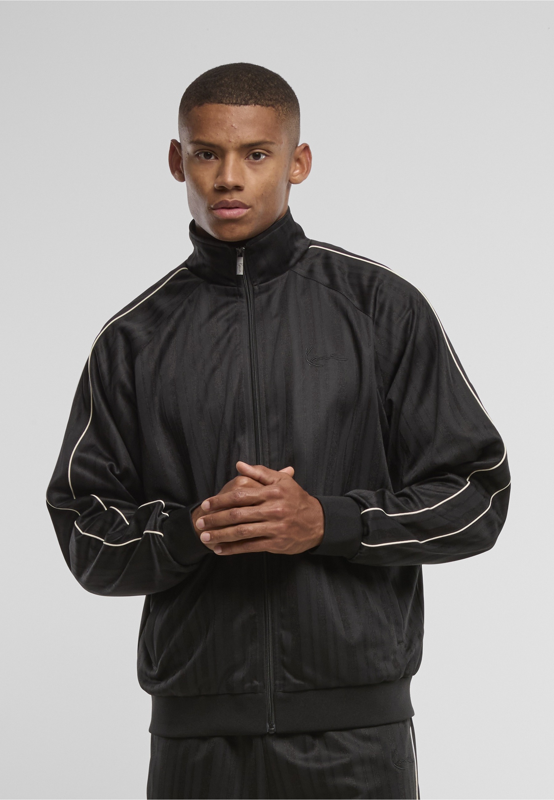 Karl Kani Outdoorjacke »Karl Kani Signature Shadow Stripe Trackjacket« 1 Stk. tlg. ohne Kapuze
