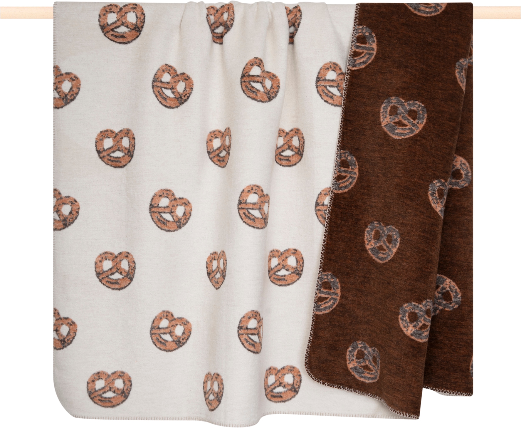 PAD Wohndecke "WINTER SPIRIT" Zwei winterliche Designs in einem Produkt – Brezel und Ski-Szene