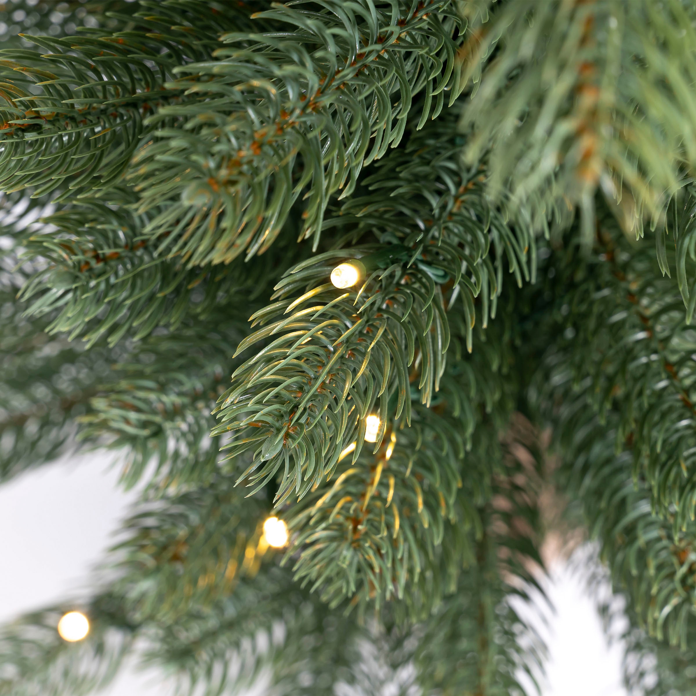 IC Winterworld Künstlicher Betonfuß, BAUR Weihnachtsdeko künstlicher Weihnachtsbaum | den um Jutebeutel Nordmanntanne, mit Batteriebetrieb »LED-Tannenbaum, kaufen Christbaum«