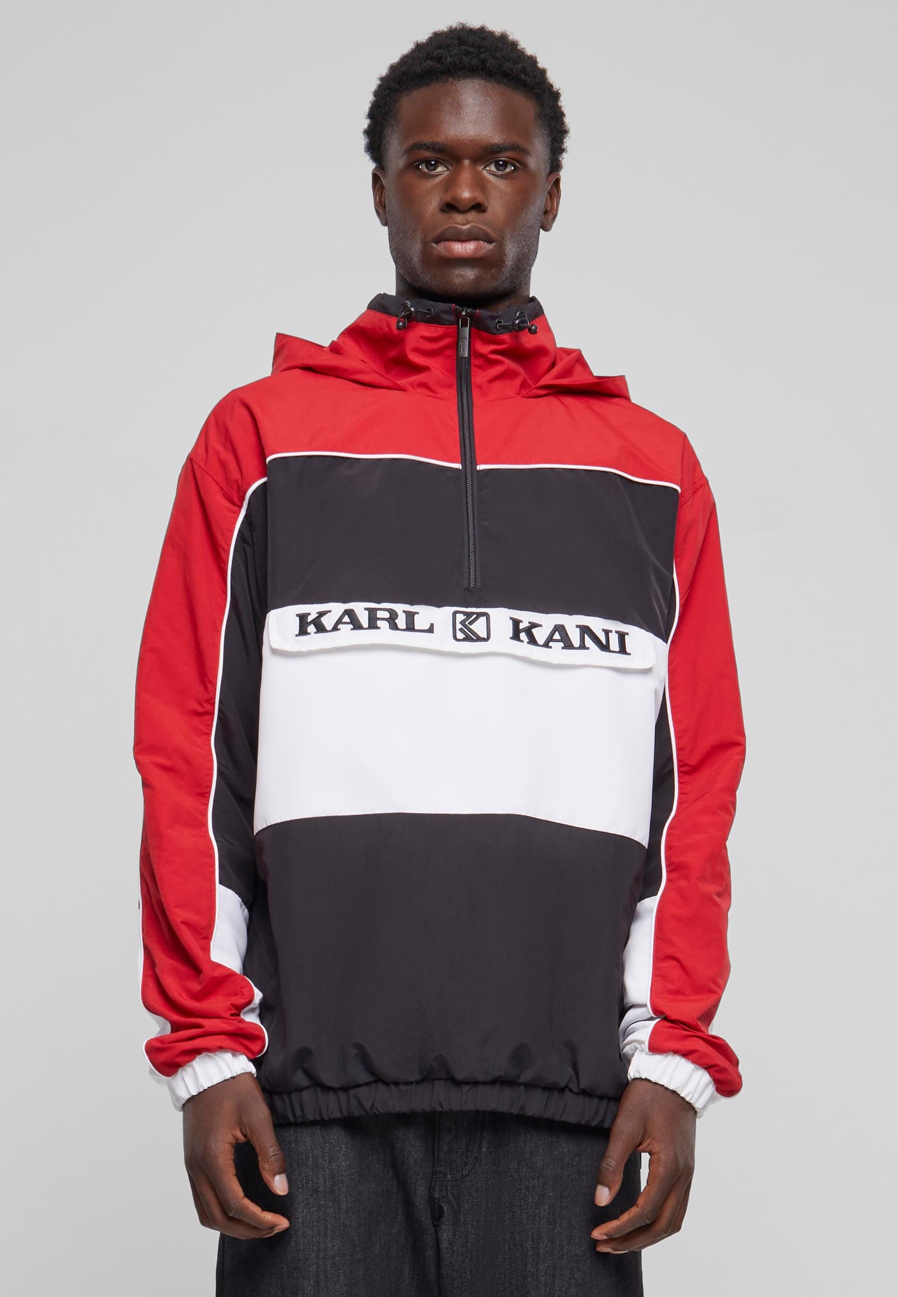 Karl Kani Windbreaker »Karl Kani Herren KM233-009-1 KK Retro Block Windbreaker«, (1 St.), mit Kapuze