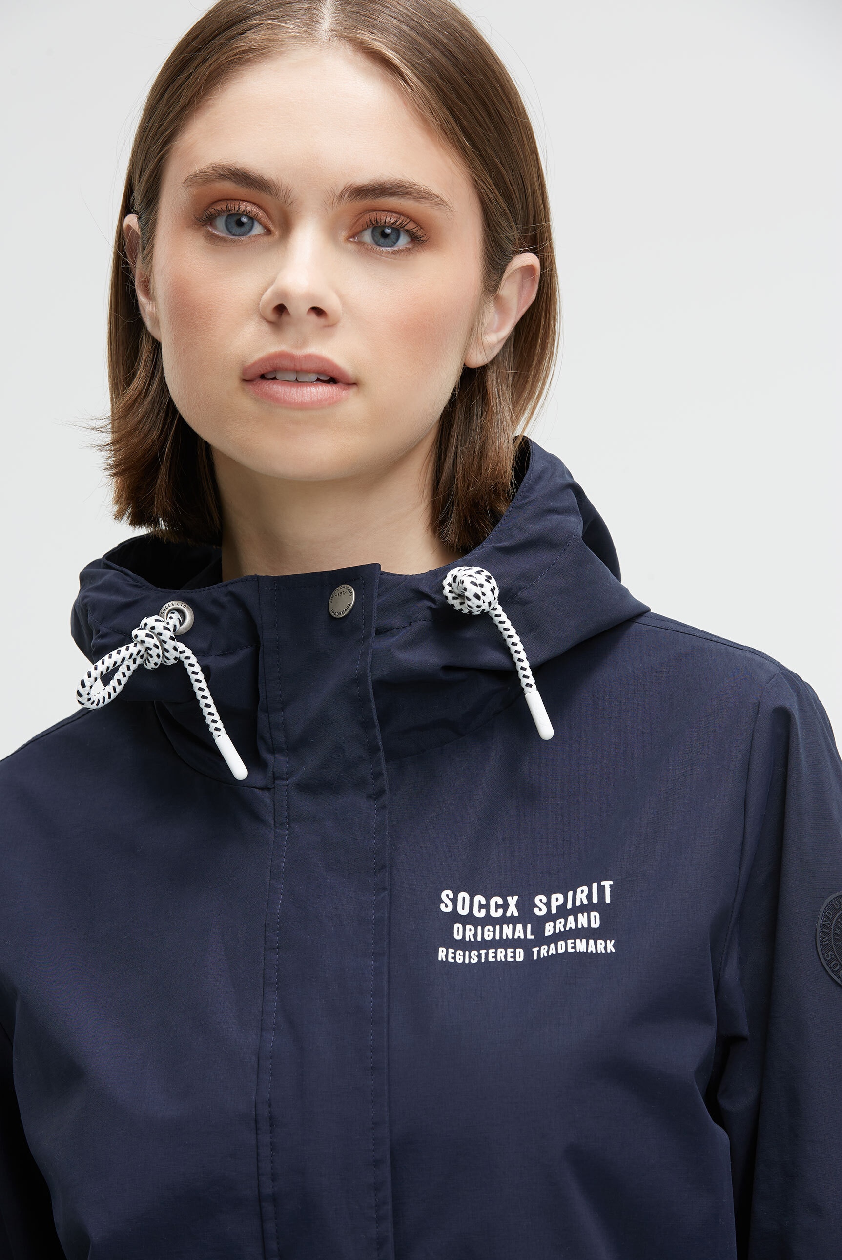 SOCCX Funktionsjacke mit Kapuze mit Windbreaker-Bündchen und Waterproof-Eingrifftaschen