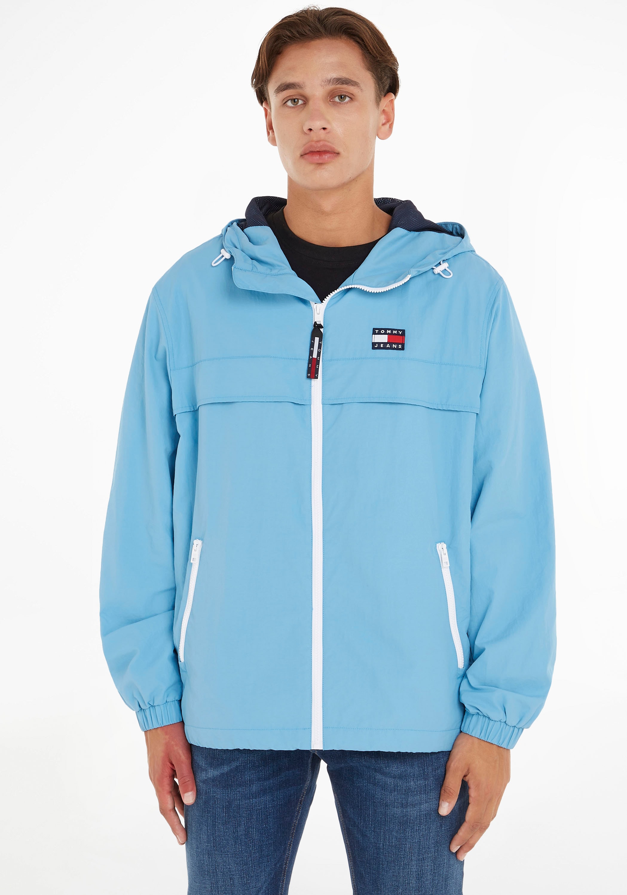 Tommy Jeans Windbreaker »TJM BAUR CHICAGO | bestellen Kapuze mit ▷ Kapuze, WINDBREAKER«, mit