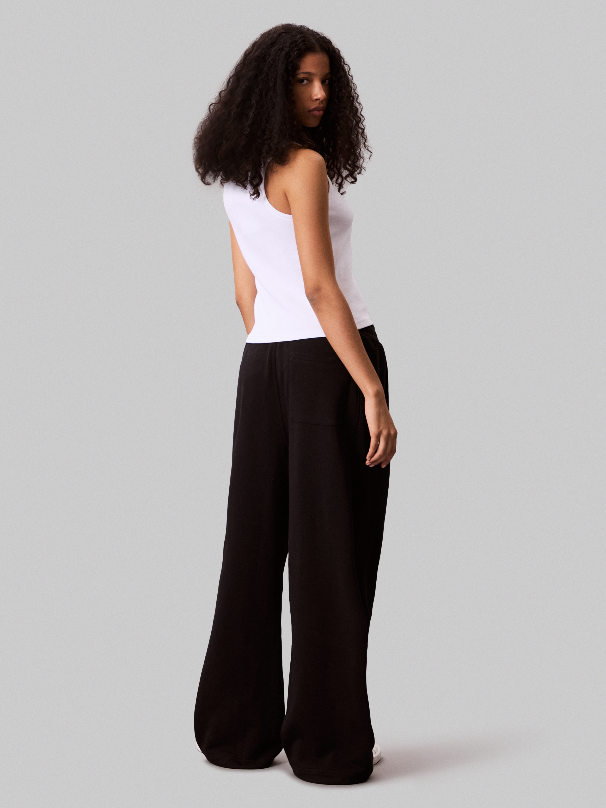 Calvin Klein Jeans Sweathose »A- FRENCH TERRY BADGE LOGO PANT«, mit weitem Bein