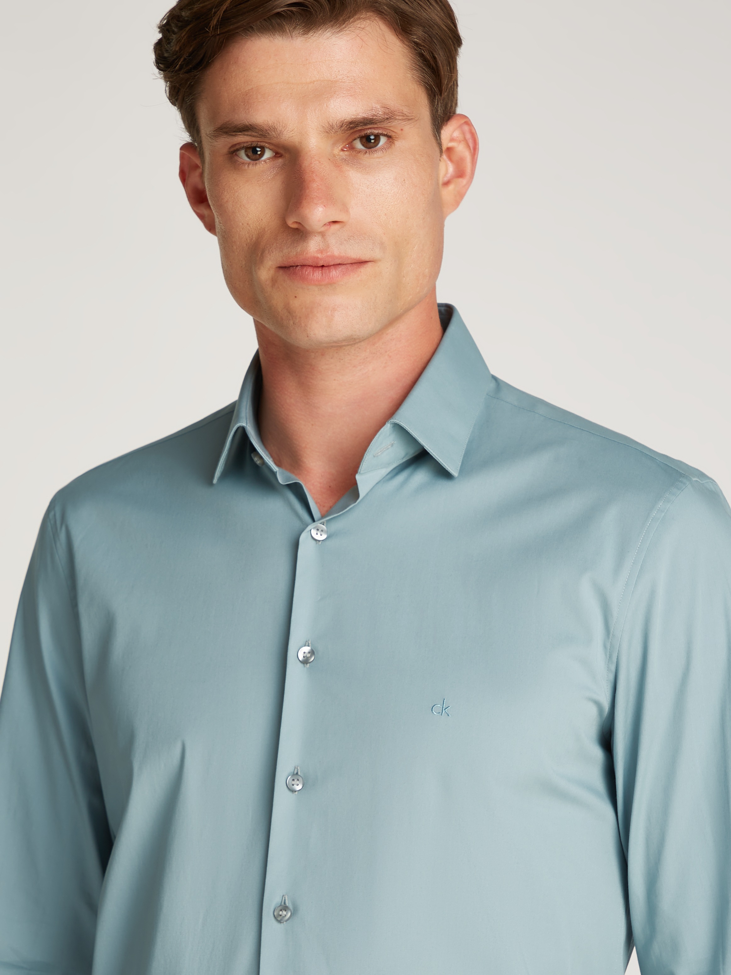 Calvin Klein Businesshemd »POPLIN STRETCH SLIM SHIRT« mit Kentkragen, Logoprint auf Brusthöhe
