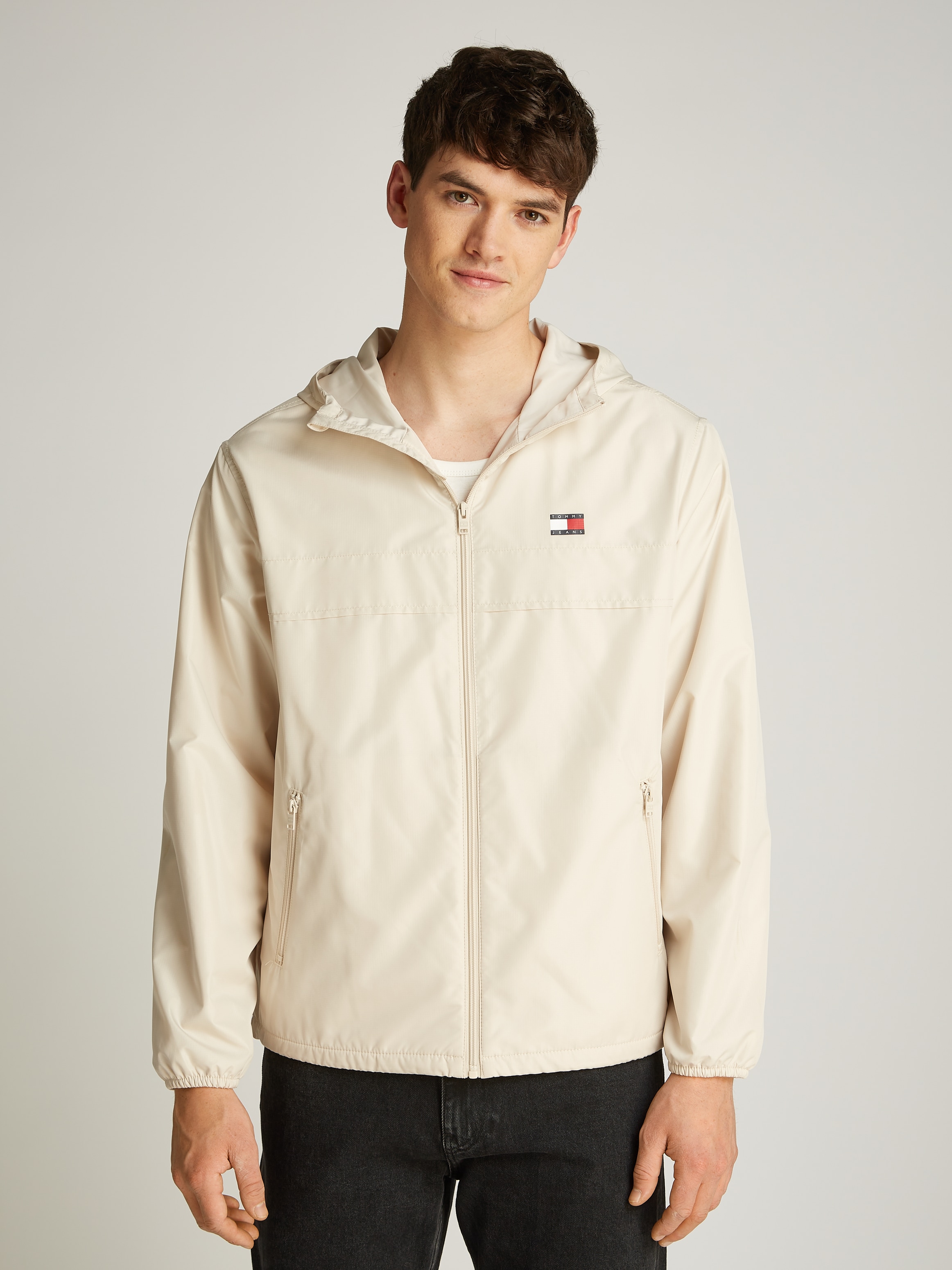 Tommy Jeans Windbreaker »TJM FLEECE LINED CHICAGO JACKET«, mit Kapuze, mit Fleece-Futter