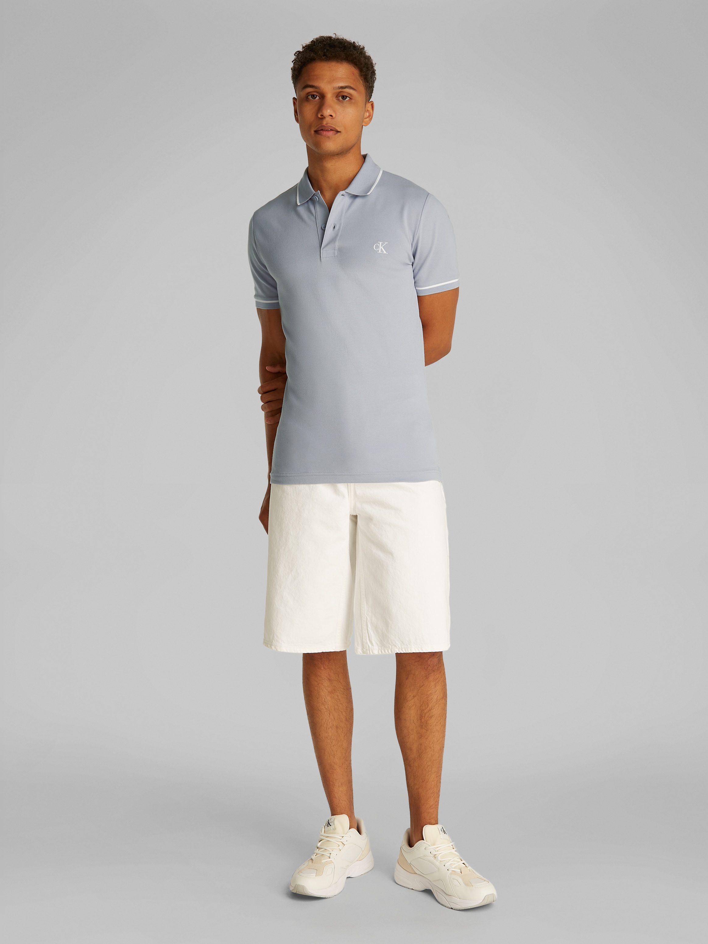 Calvin Klein Jeans Poloshirt »TIPPING SLIM POLO«, mit Streifendetail am Kragen
