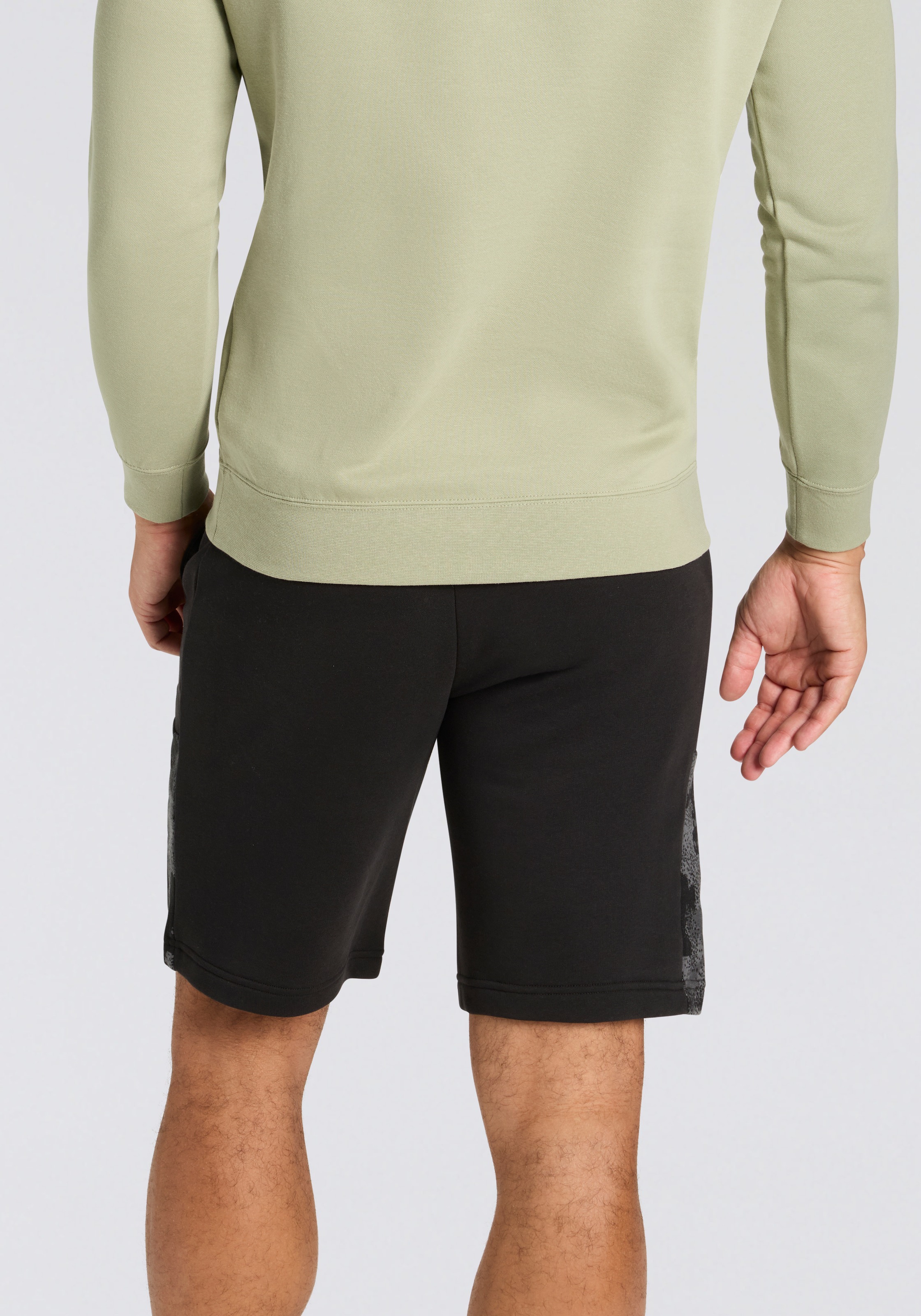 PUMA Trainingsshorts "ESS CAMO SHORTS TR 10’’" mit Eingrifftaschen, sportli günstig online kaufen