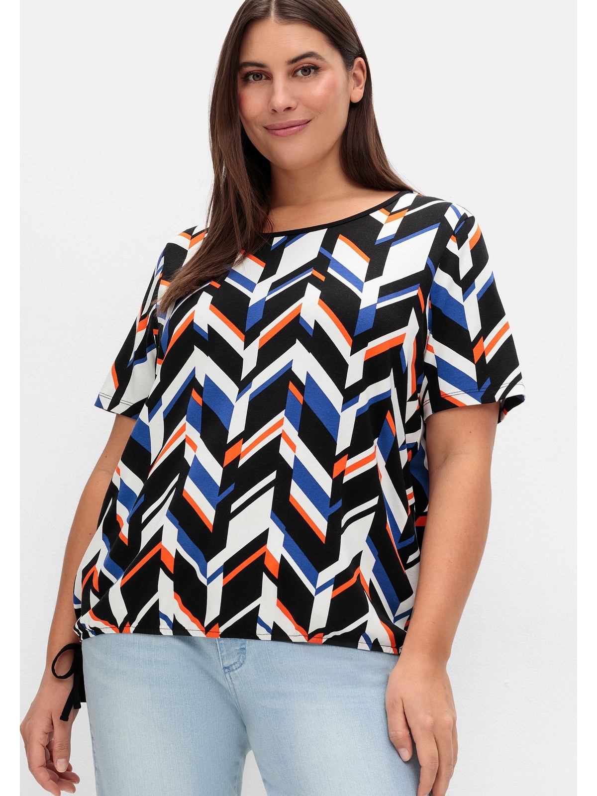 Sheego T-Shirt "Große Größen", mit Grafikprint und Saum-Gummizug günstig online kaufen