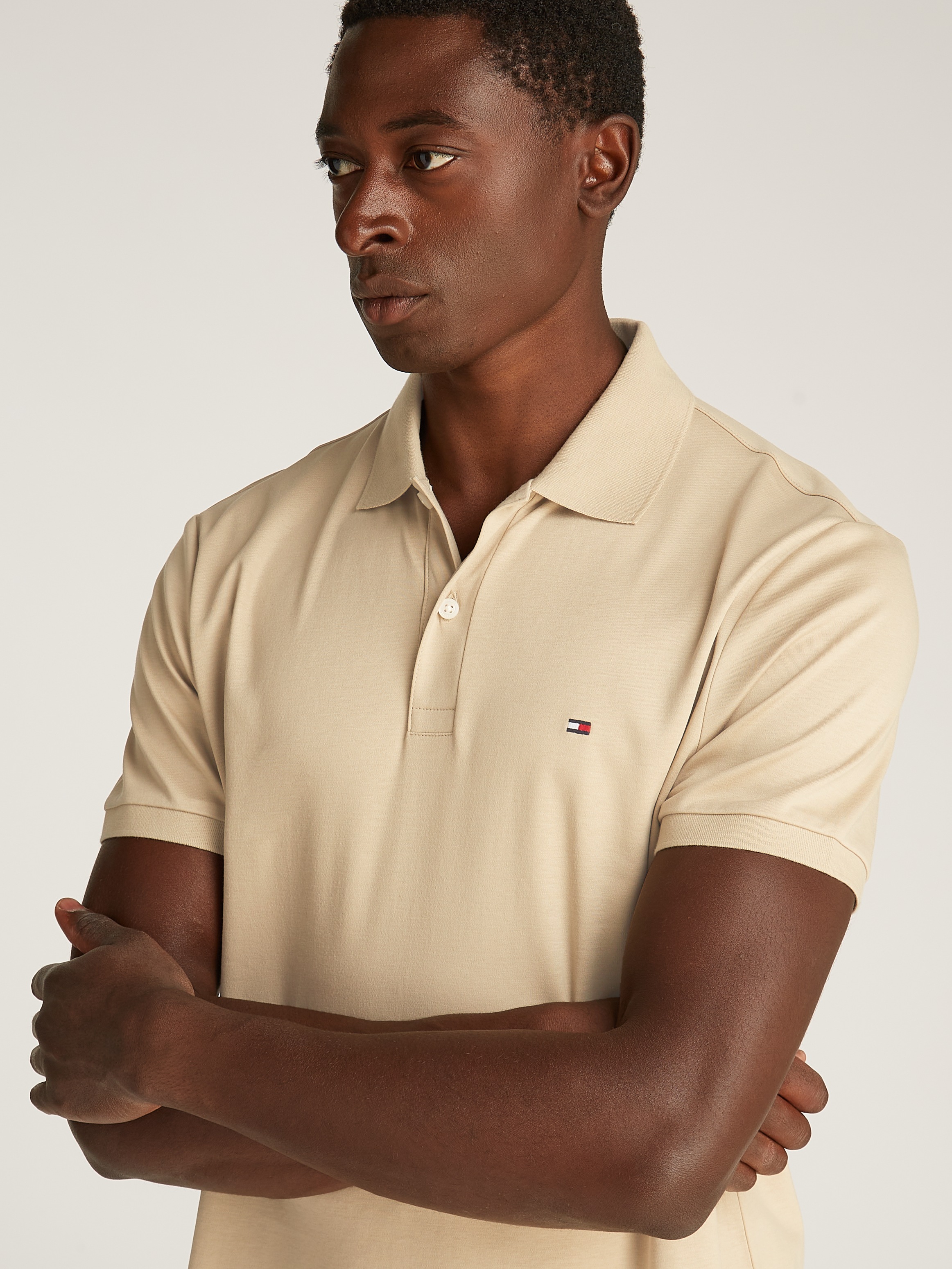 Tommy Hilfiger Poloshirt "LIQUID COTTON REG SEASONAL POLO", mit Logosticker günstig online kaufen