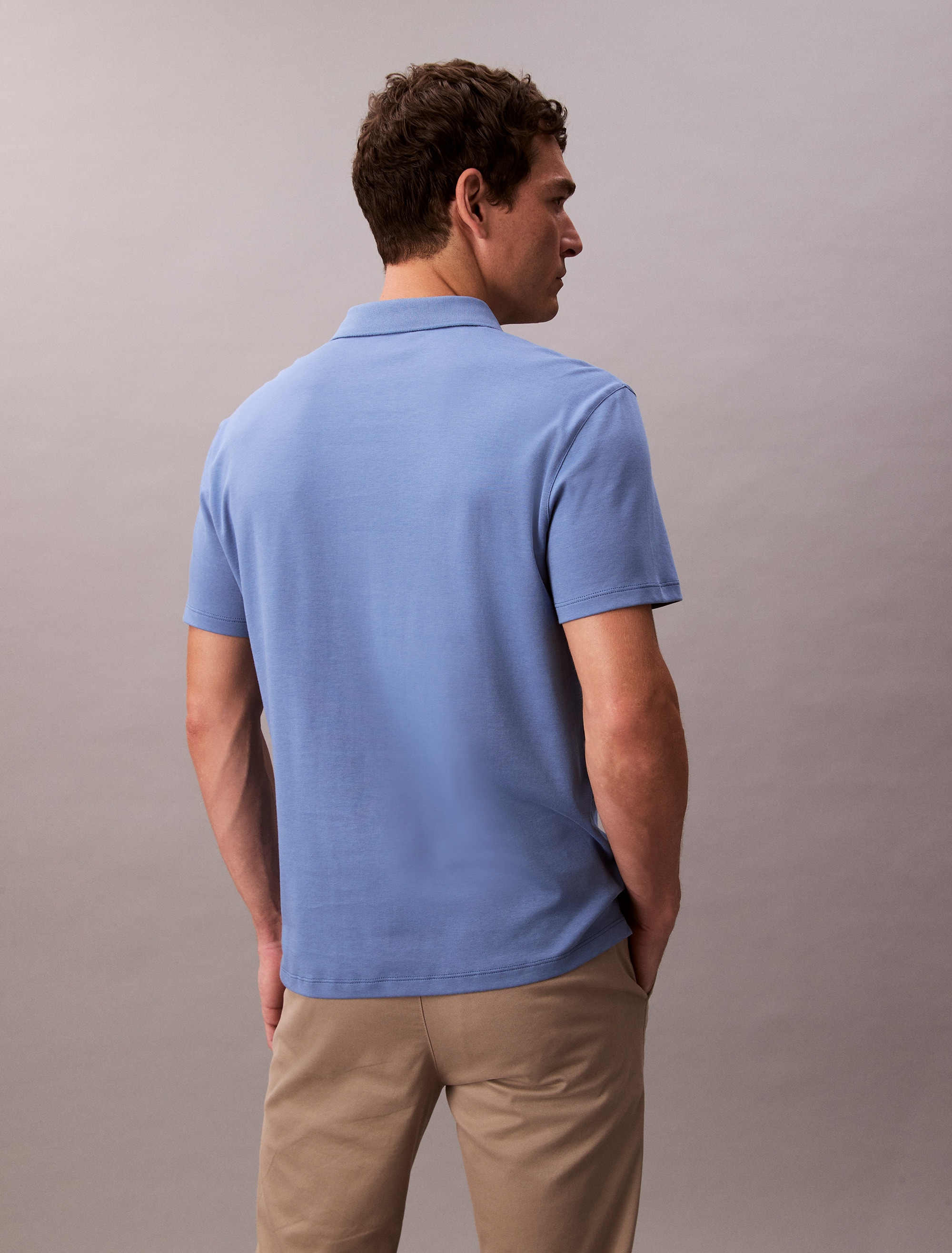 Calvin Klein Poloshirt »SS SUPIMA CHEST EMB POLO«, Mit Rundhalsausschnitt