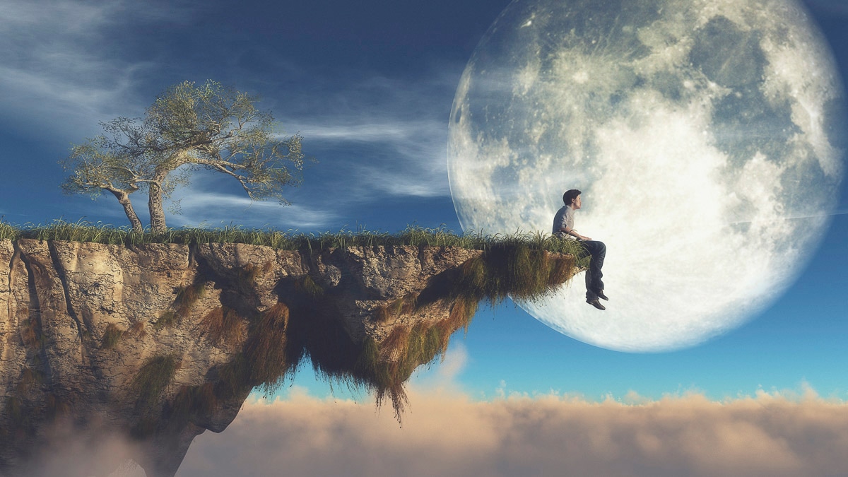 Papermoon Fototapete "Mann an Klippe vor Mond"