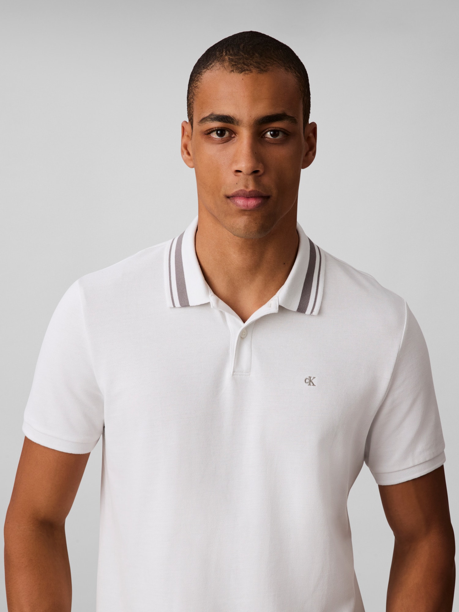Calvin Klein Jeans Poloshirt »SS CSL PQ CLSSC TPPD«, Mit Rundhalsausschnitt