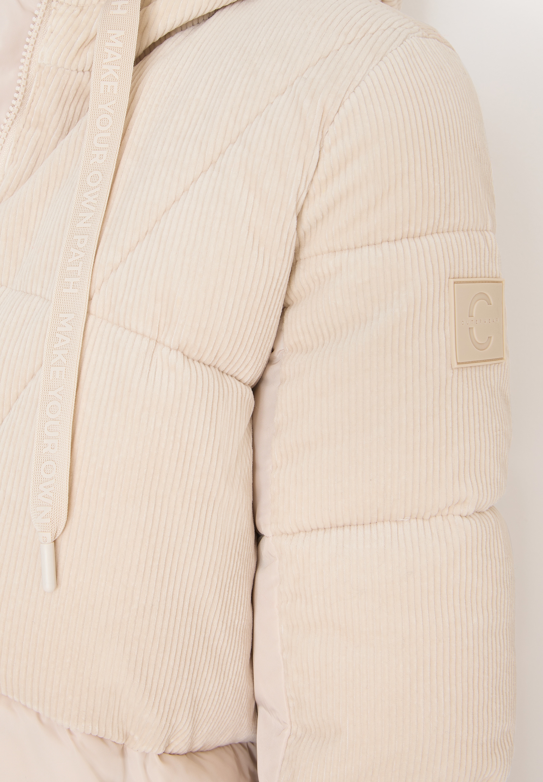 Cecil Steppmantel , mit Kapuze