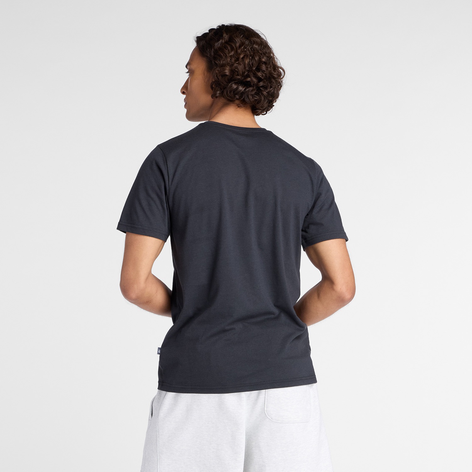 Thumbnail - New Balance Trainingsshirt "Heathertech Graphic T-Shirt 2 BLACK" für sportliche Aktivitäten, sportlicher Stil, atmungsak...