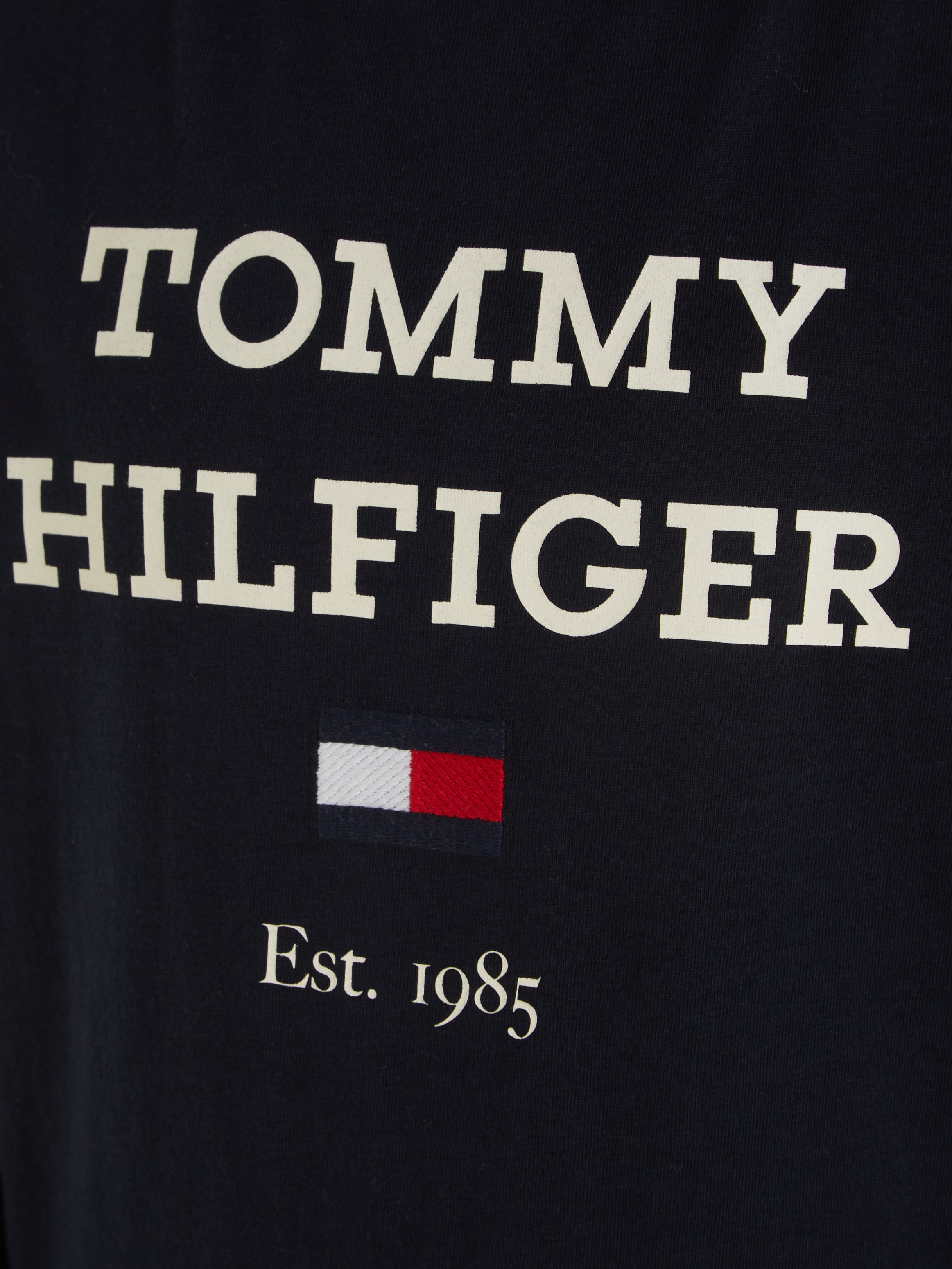 auf BAUR Langarmshirt mit Logo L/S«, ▷ | Tommy der »TH für TEE Hilfiger LOGO großem Brust