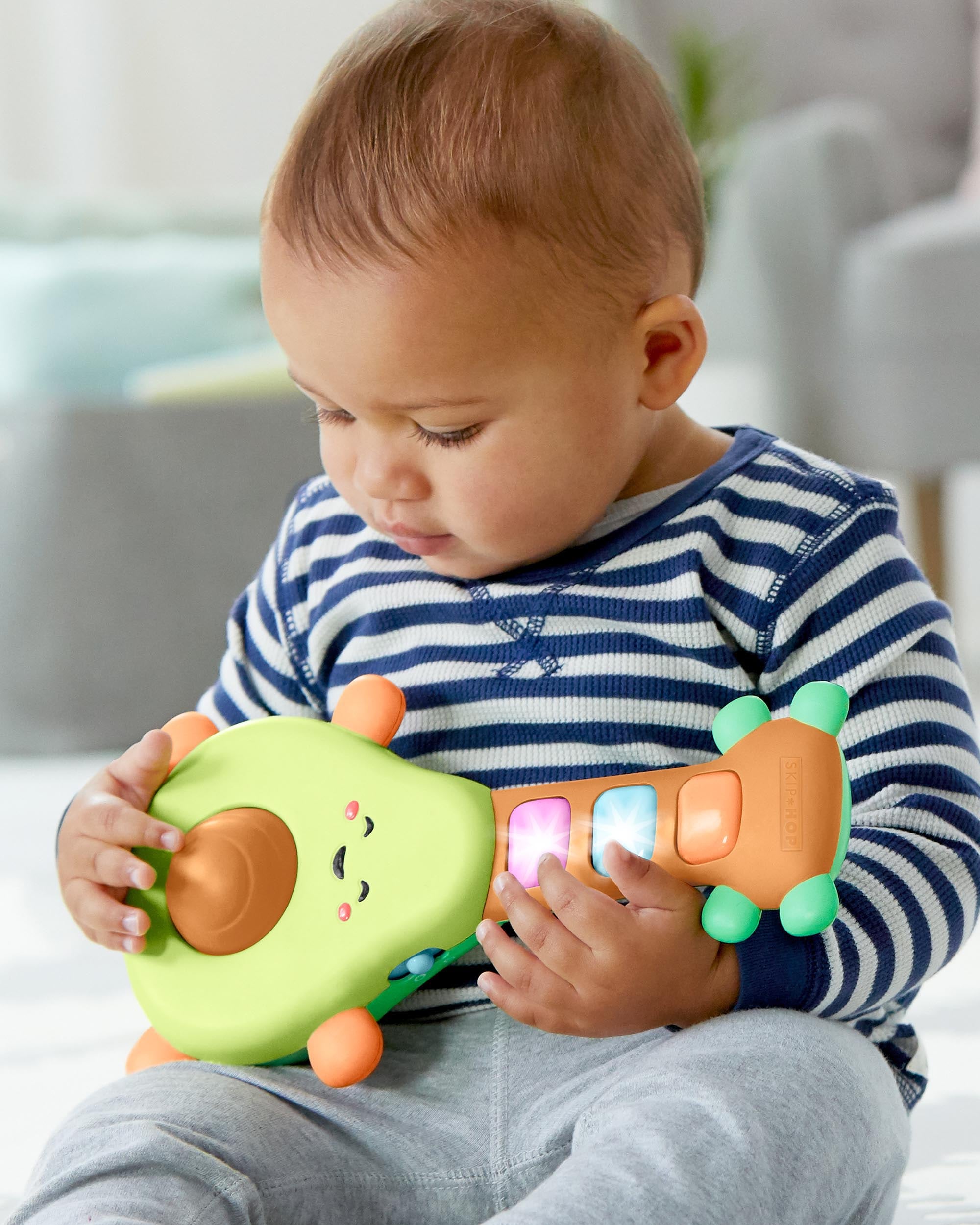 Skip Hop Spielzeug-Musikinstrument »Rock-A-Mole Avocado Gitarre«