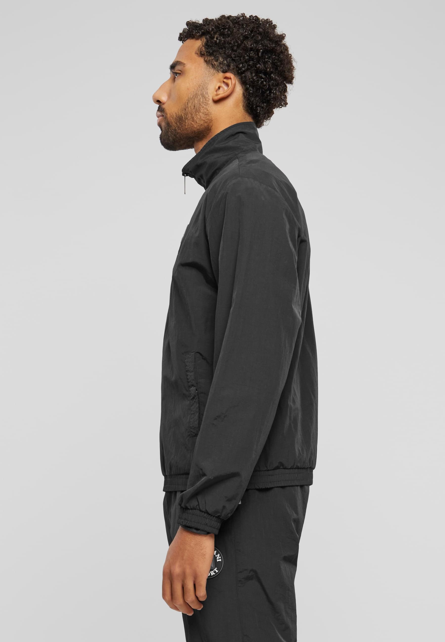 Karl Kani Allwetterjacke »Karl Kani Herren KM241-045-2 Karl Kani Og Track Troyer«, (1 St.), ohne Kapuze