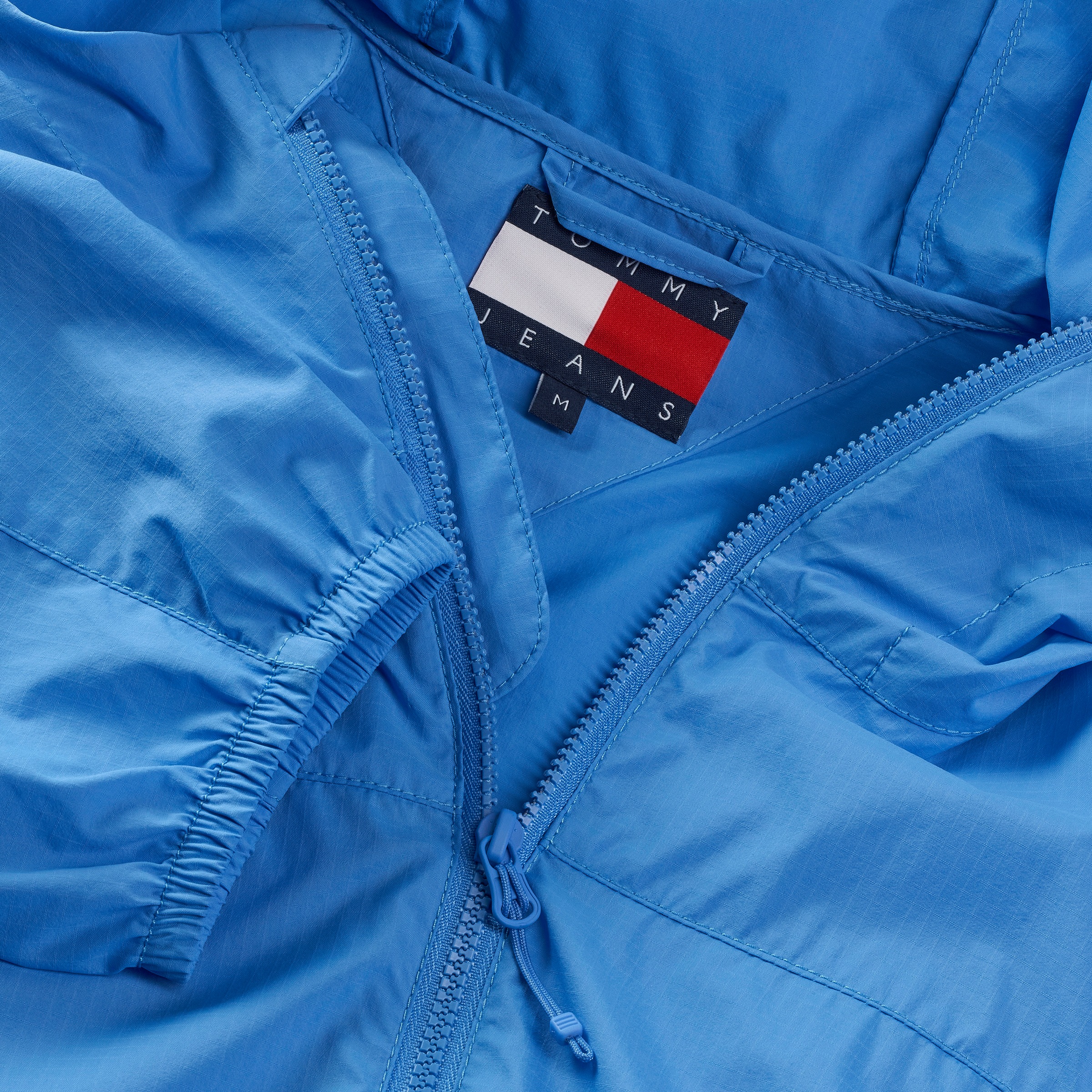 Tommy Jeans Outdoorjacke »TJM OUTDOOR SHELL JACKET EXT«, mit Kapuze, Mit Rundhalsausschnitt