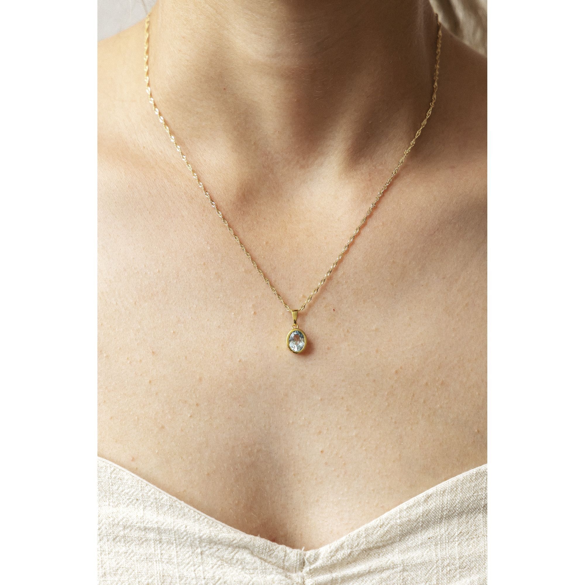 CELESTA Kette mit Anhänger »375/- Gelbgold Blautopas (beh)«