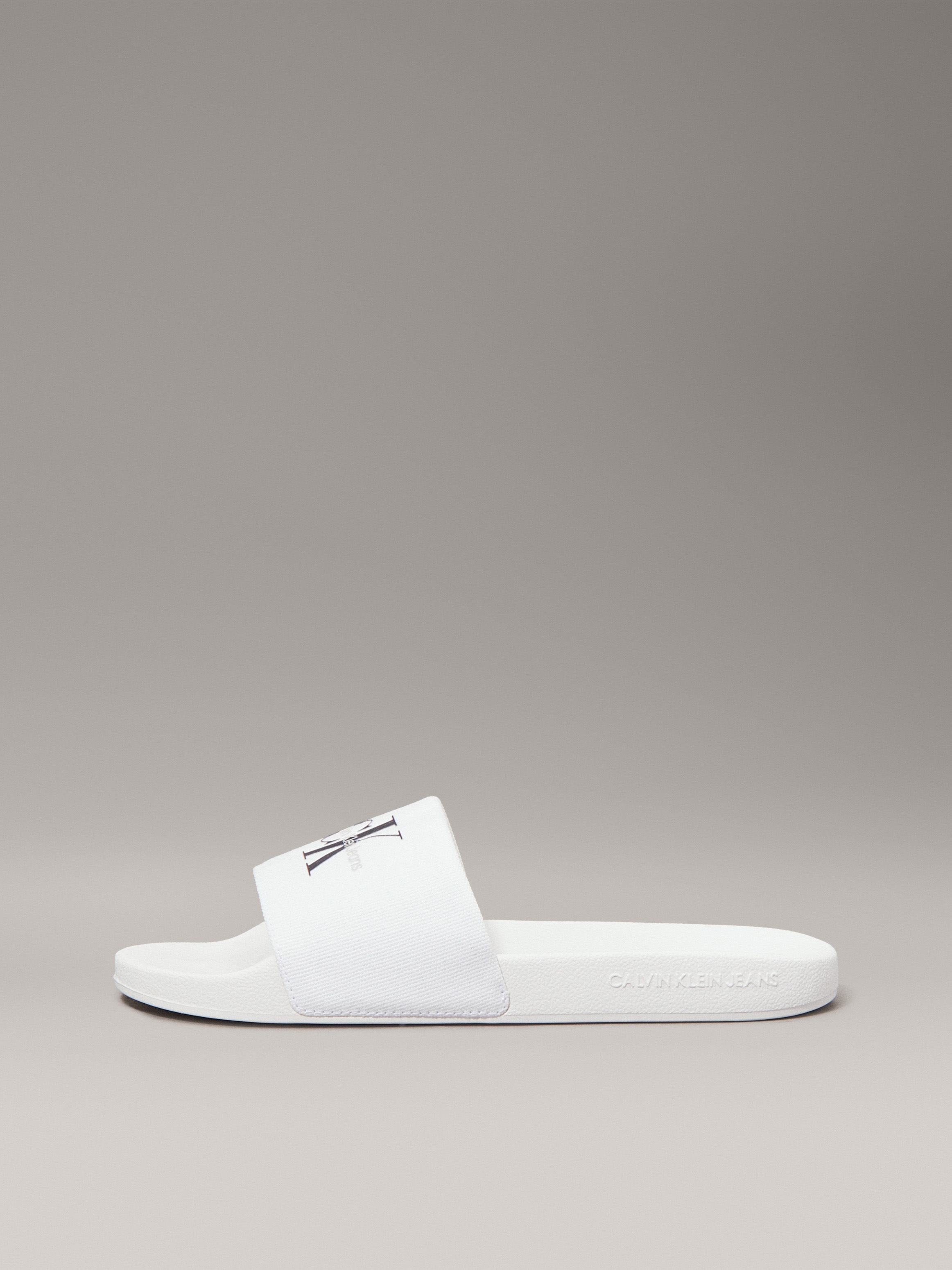 Calvin Klein Jeans Pantolette »SLIDE MONOGRAM WMNS«, Poolslides, Schlappen, Sommerpantolette, Strandschuh zum Schlupfen