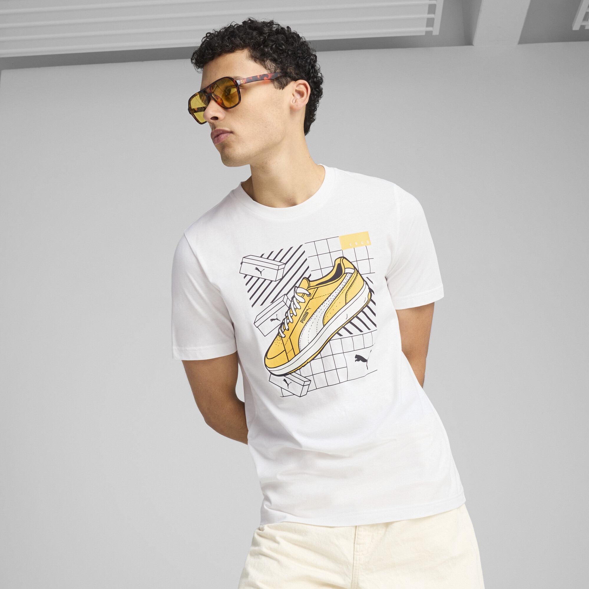 PUMA T-Shirt »Graphics Sneaker T-Shirt Herren«