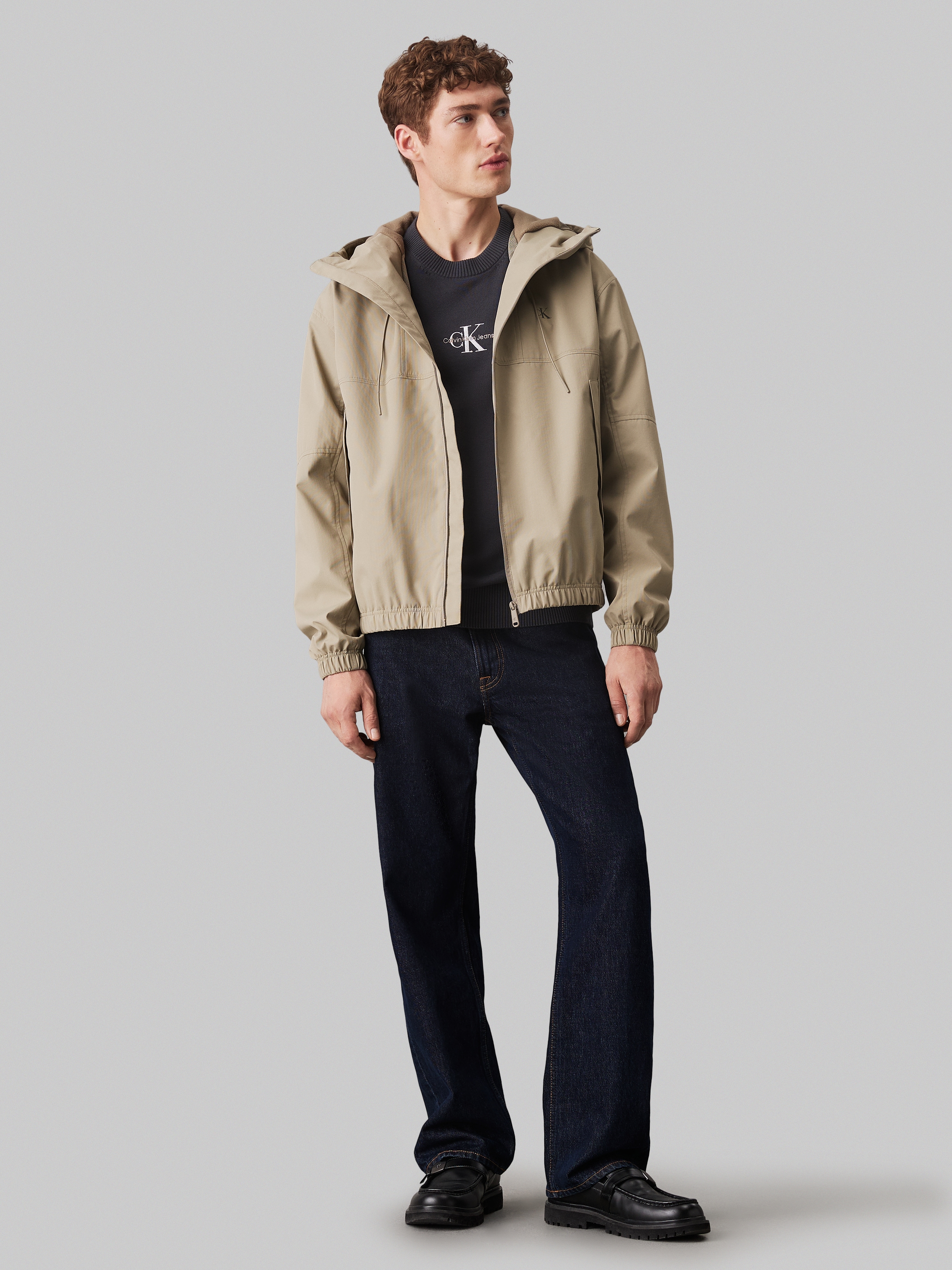 Calvin Klein Jeans Allwetterjacke »TECHNICAL JACKET« mit Kapuze Logodruck, Eingriffstaschen