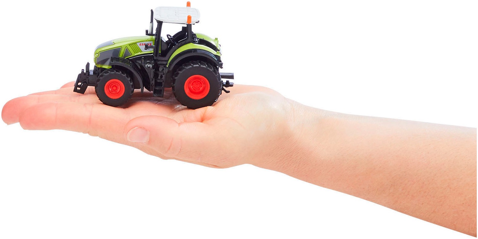 Revell® Spielzeug-Adventskalender »Bauernhofabenteuer, mit RC Traktor Claas Axion 960 zum Selberbauen«, ab 6 Jahren, inklusive Bauernhoftieren und -zubehör