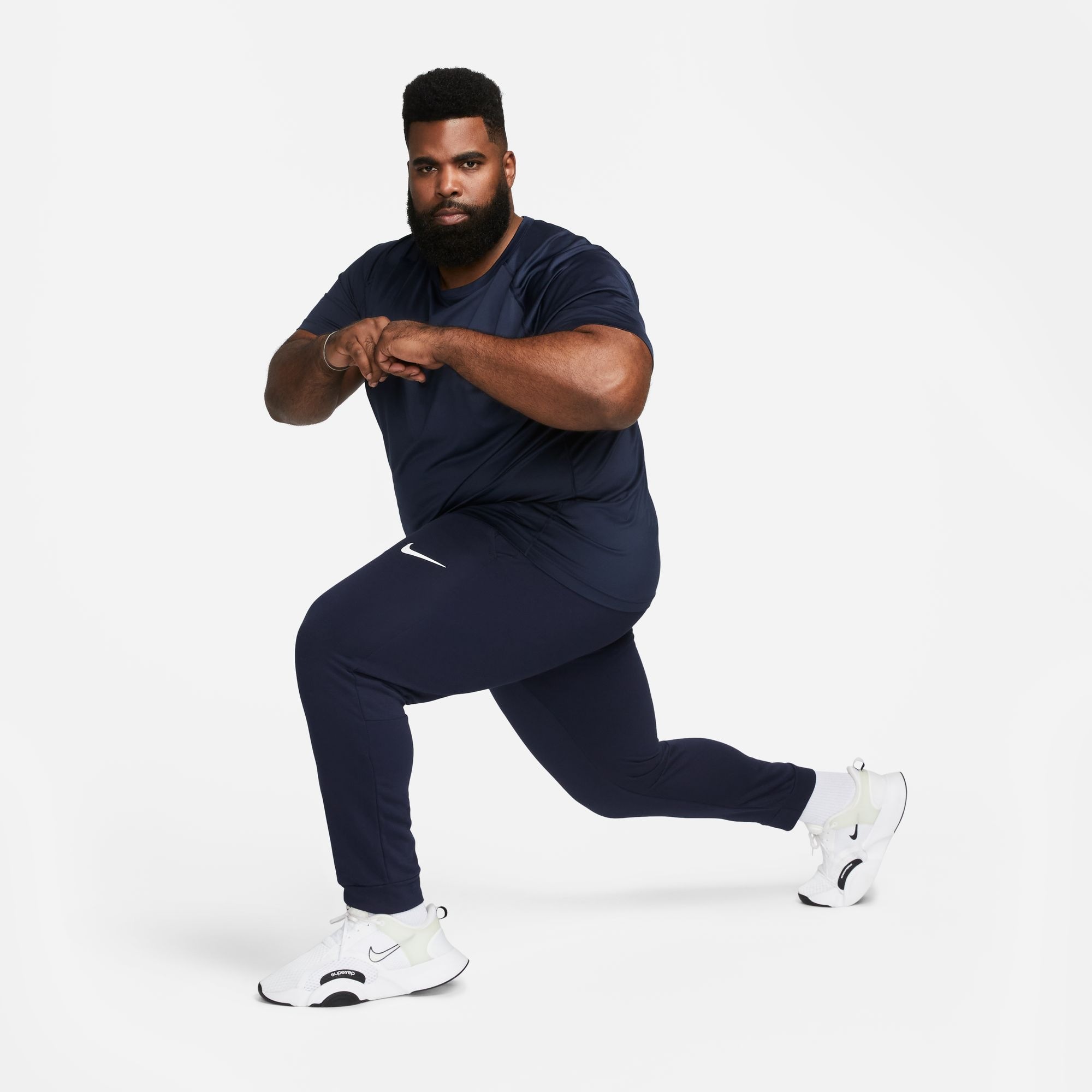 Nike Trainingshose »DRI-FIT MEN'S TAPERED TRAINING PANTS«