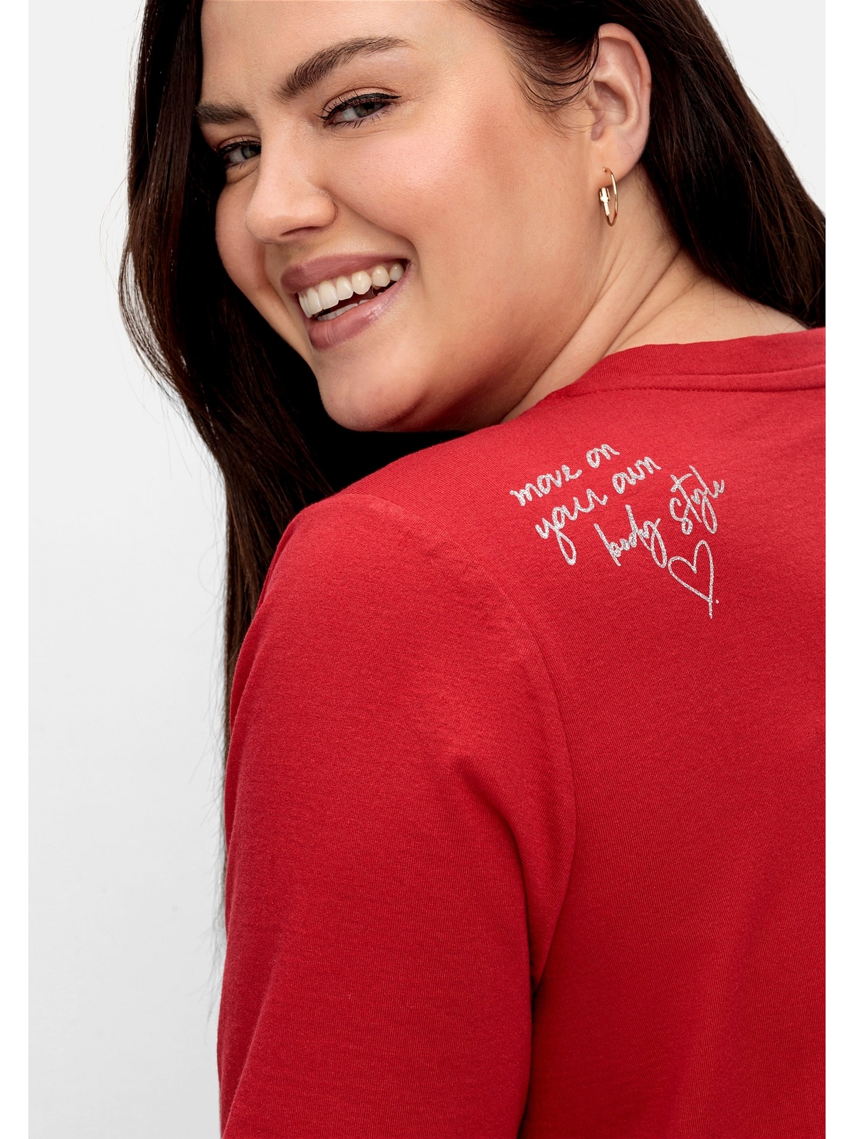 | Größen«, auf kaufen Sheego Glitzerdruck T-Shirt BAUR mit für der Schulter kleinem »Große