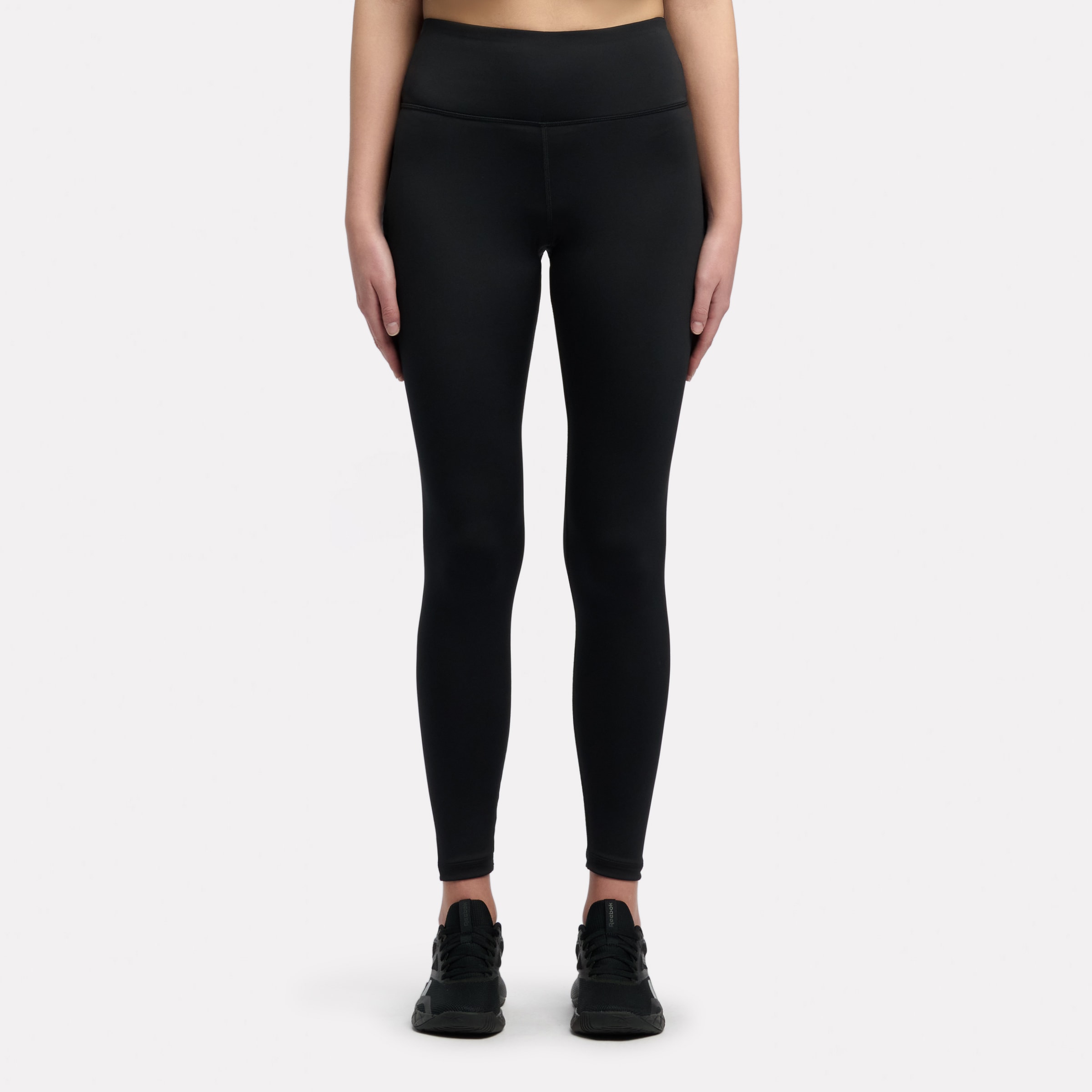 Reebok Leggings "CORE HIGH RISE LEGGINGS" glatte Oberfläche, aus Polyester und Elasthan, schlanke Silhouette