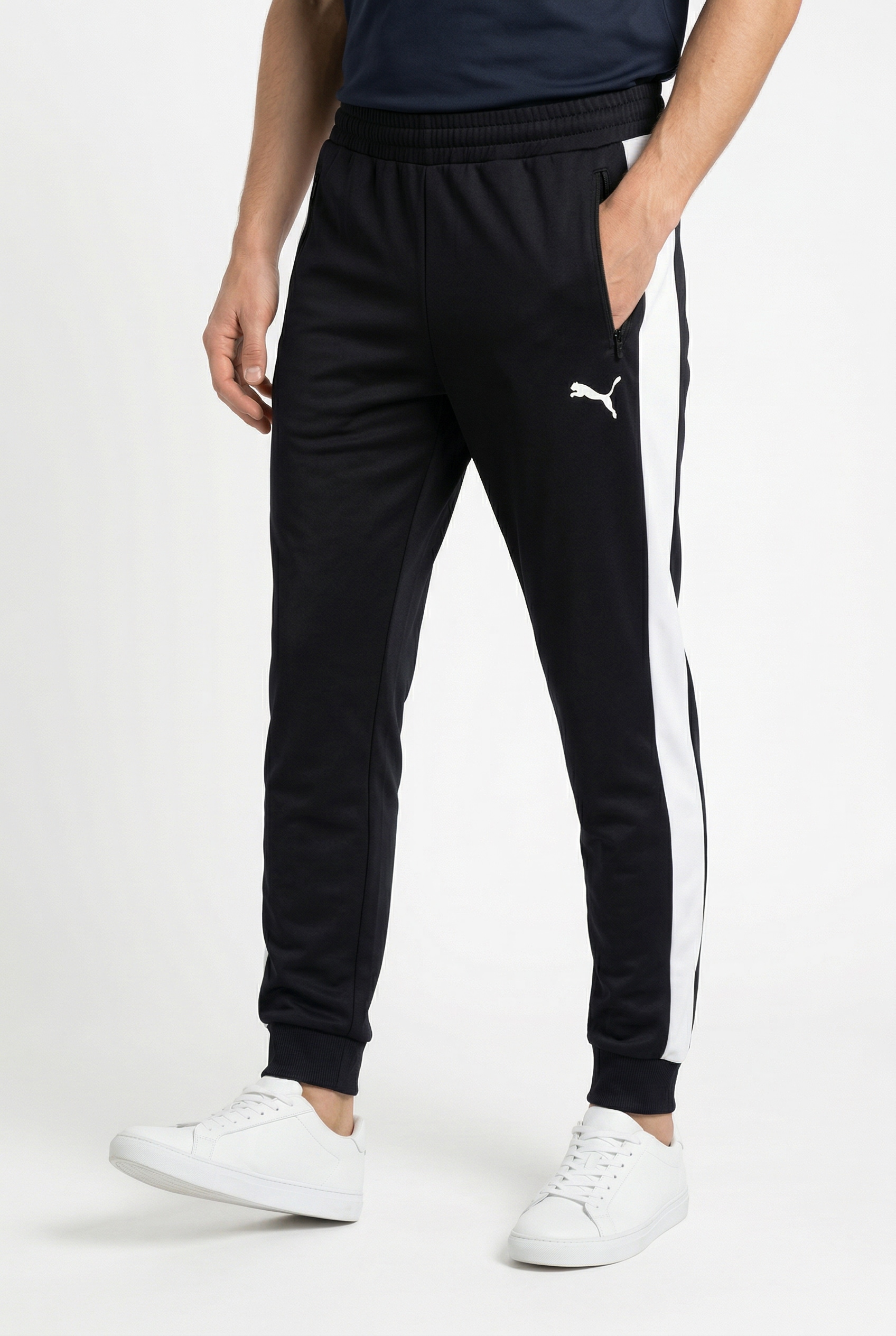 PUMA Trainingshose "T7 FOUNDATION CL POLY KNITTED PANTS" mit Eingrifftaschen, Regular Fit, sportlicher Stil