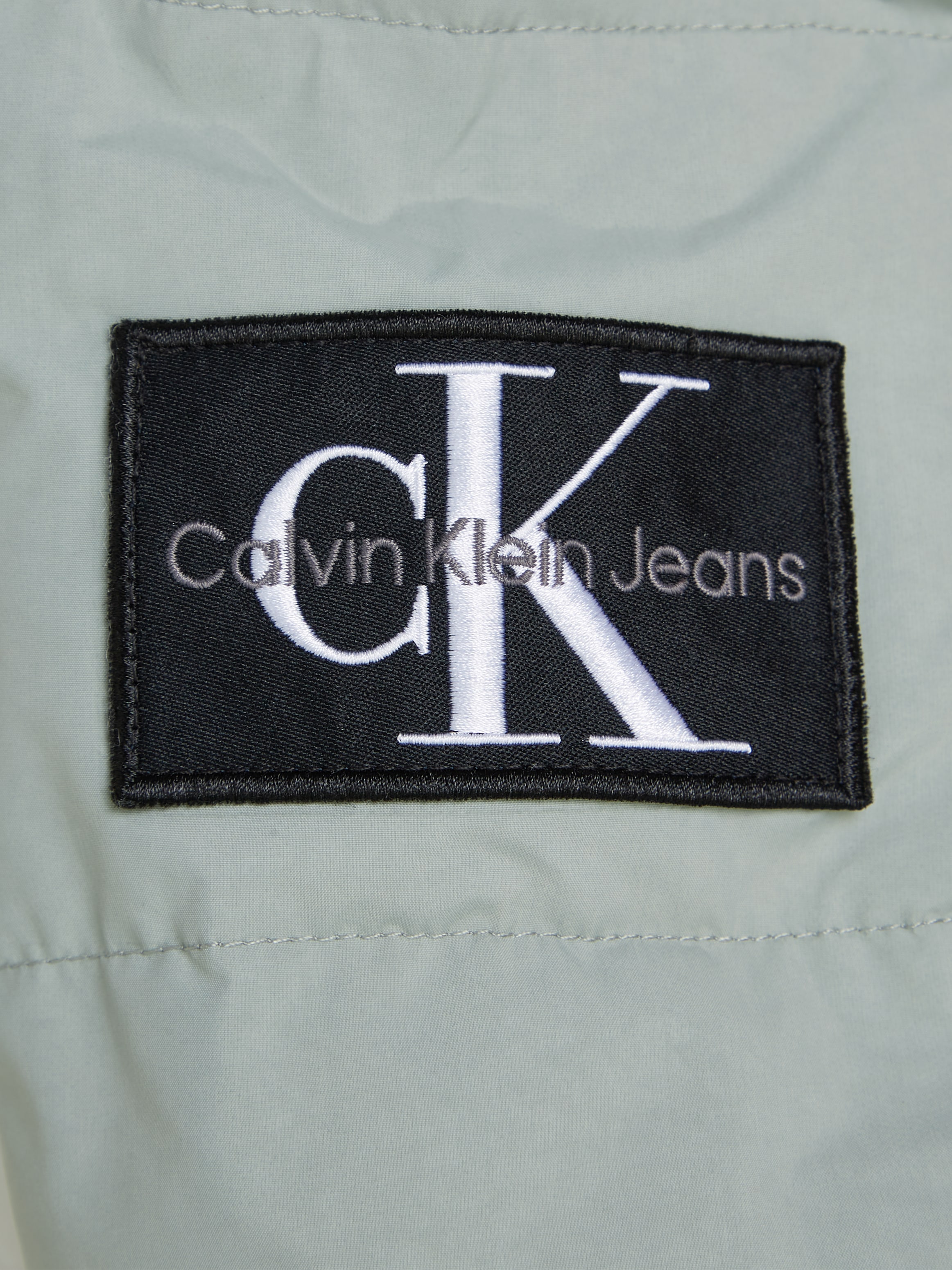 Calvin Klein Jeans Outdoorjacke »ESSENTIAL LW PADDED JACKET«, mit Kapuze, mit Logopatch