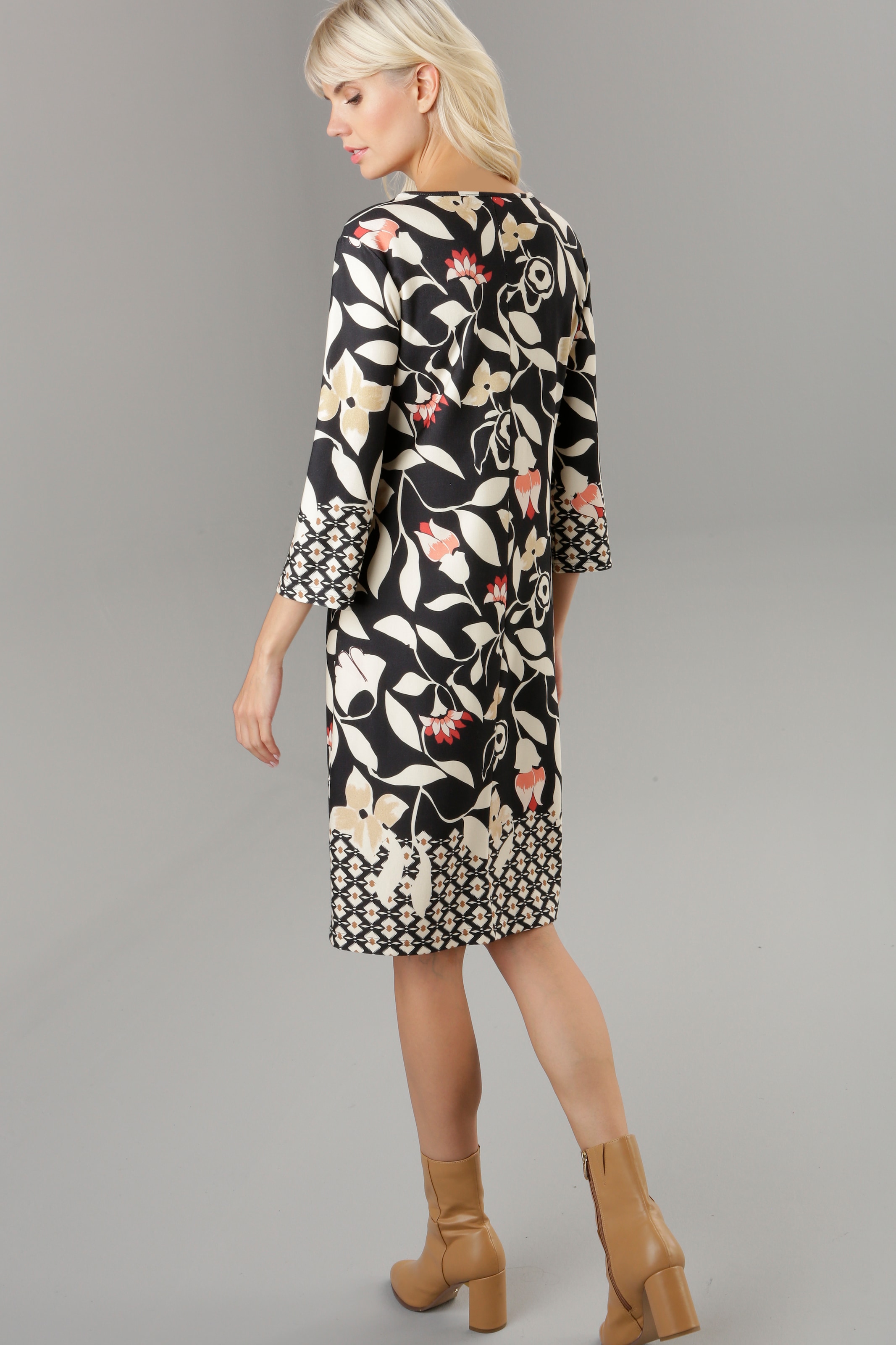 Aniston SELECTED Jerseykleid, mit gemusterten Bordüren