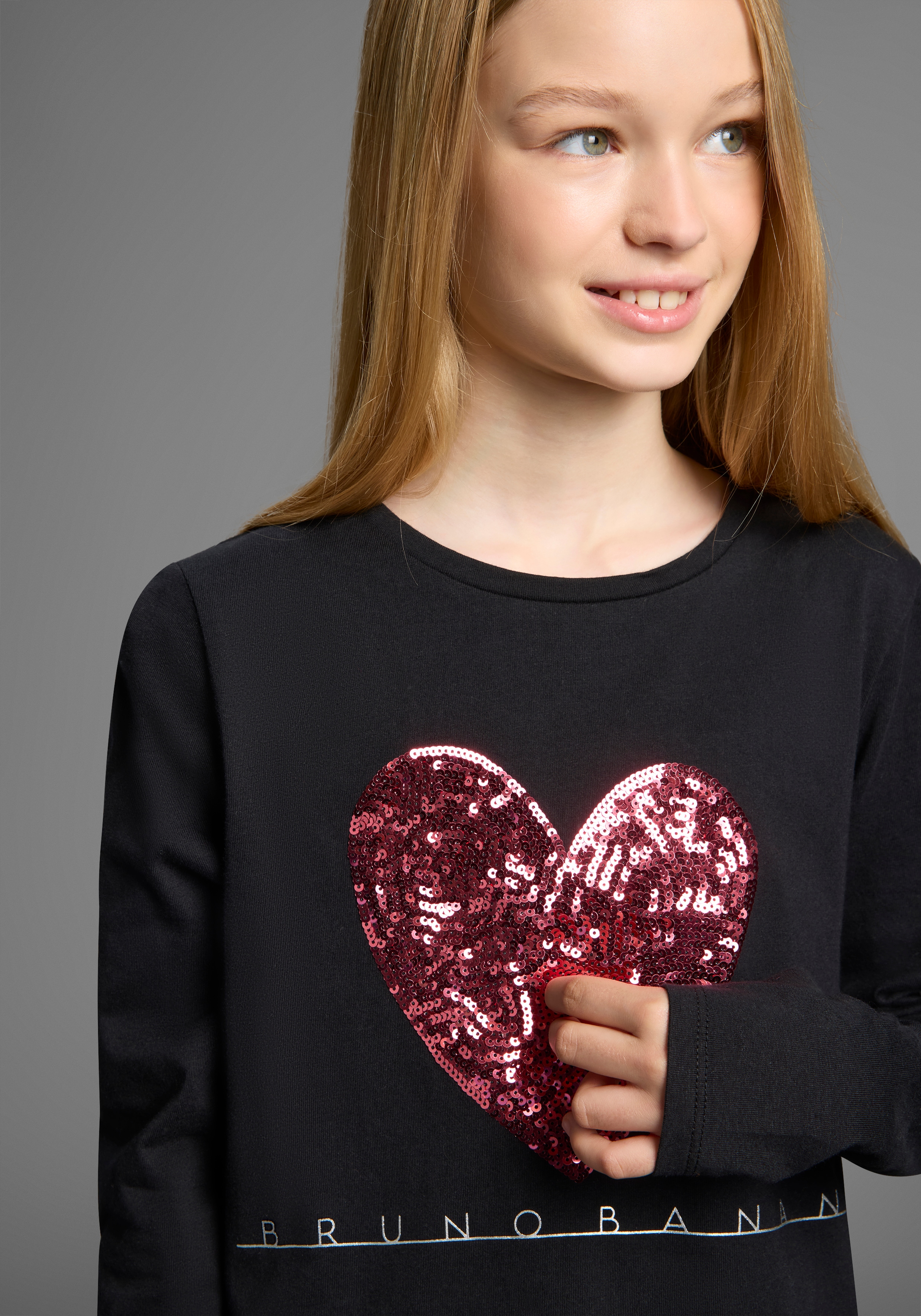 Bruno Banani Langarmshirt "WENDE-Pailletten - Glitzerherz" Für TEENS. Cooles Paillettenshirt